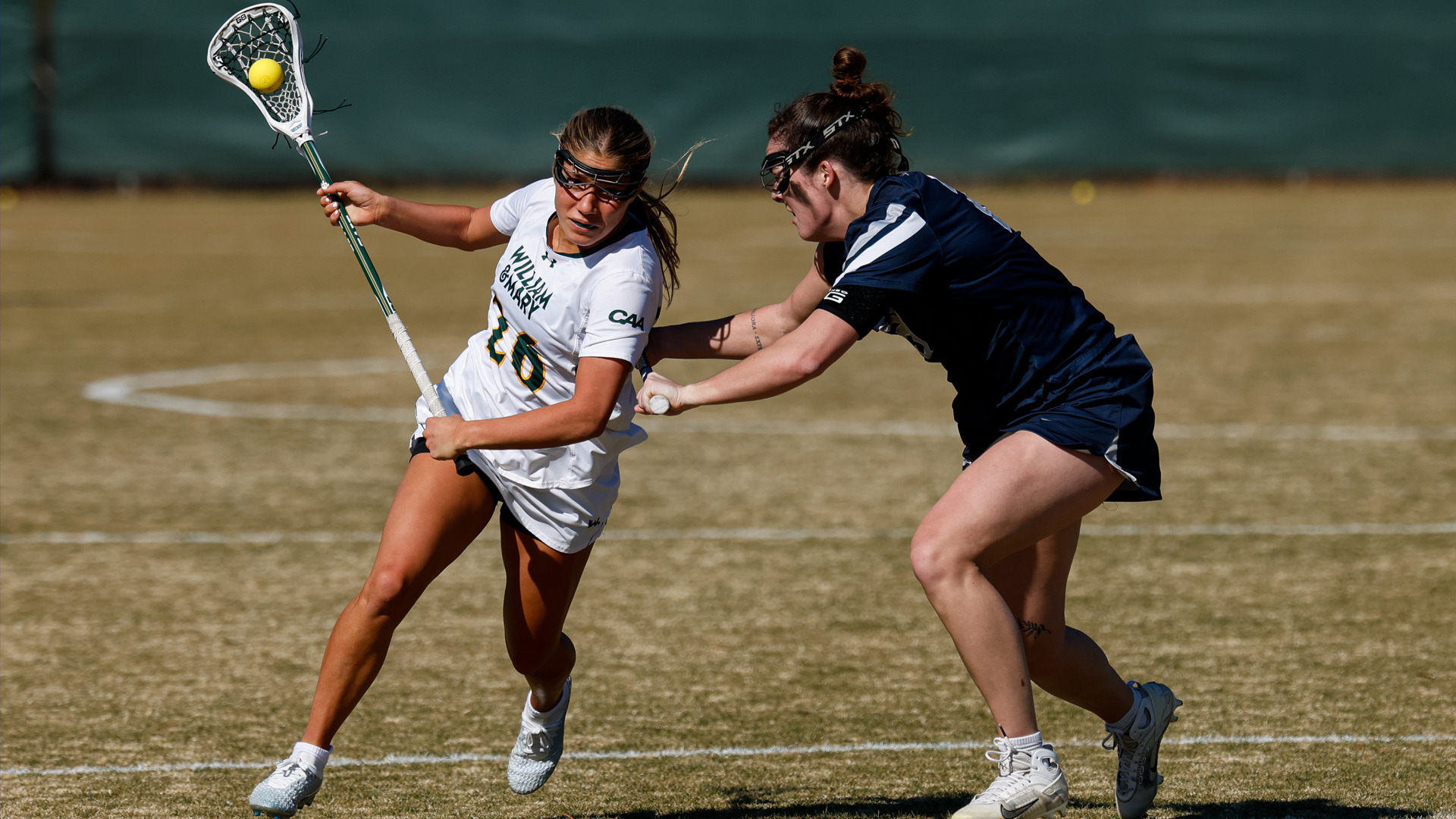 Mila Millhouse runs past a Longwood defender