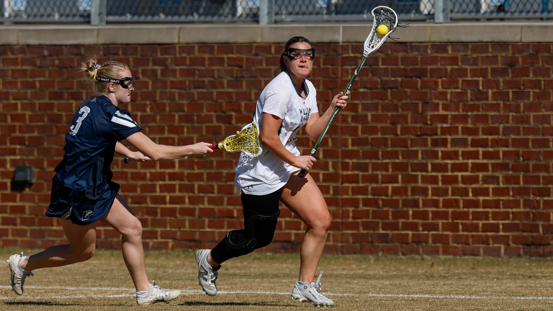 Molly Delaney looks to make a pass during a game at Martin Family Stadium