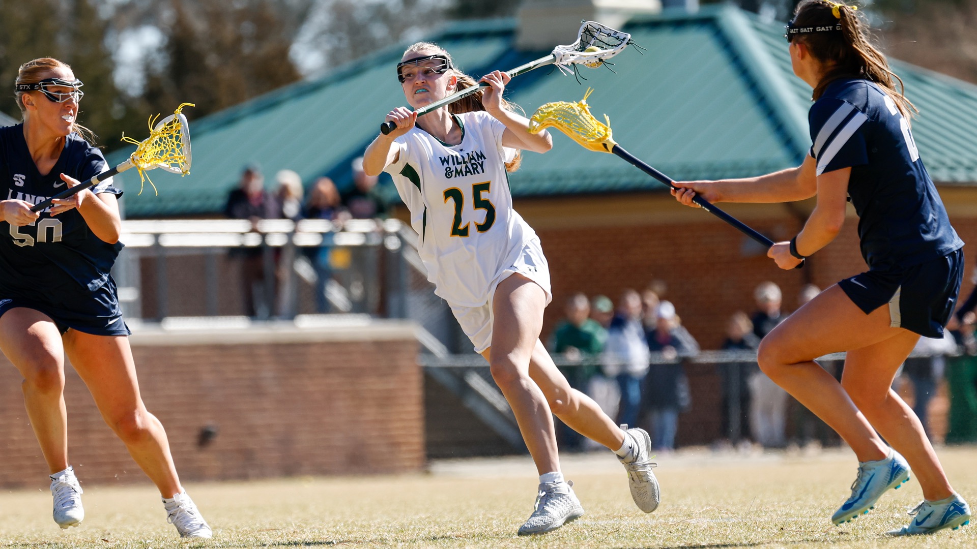 Nora Begley attempts a shot versus Longwood at Martin Family Stadium
