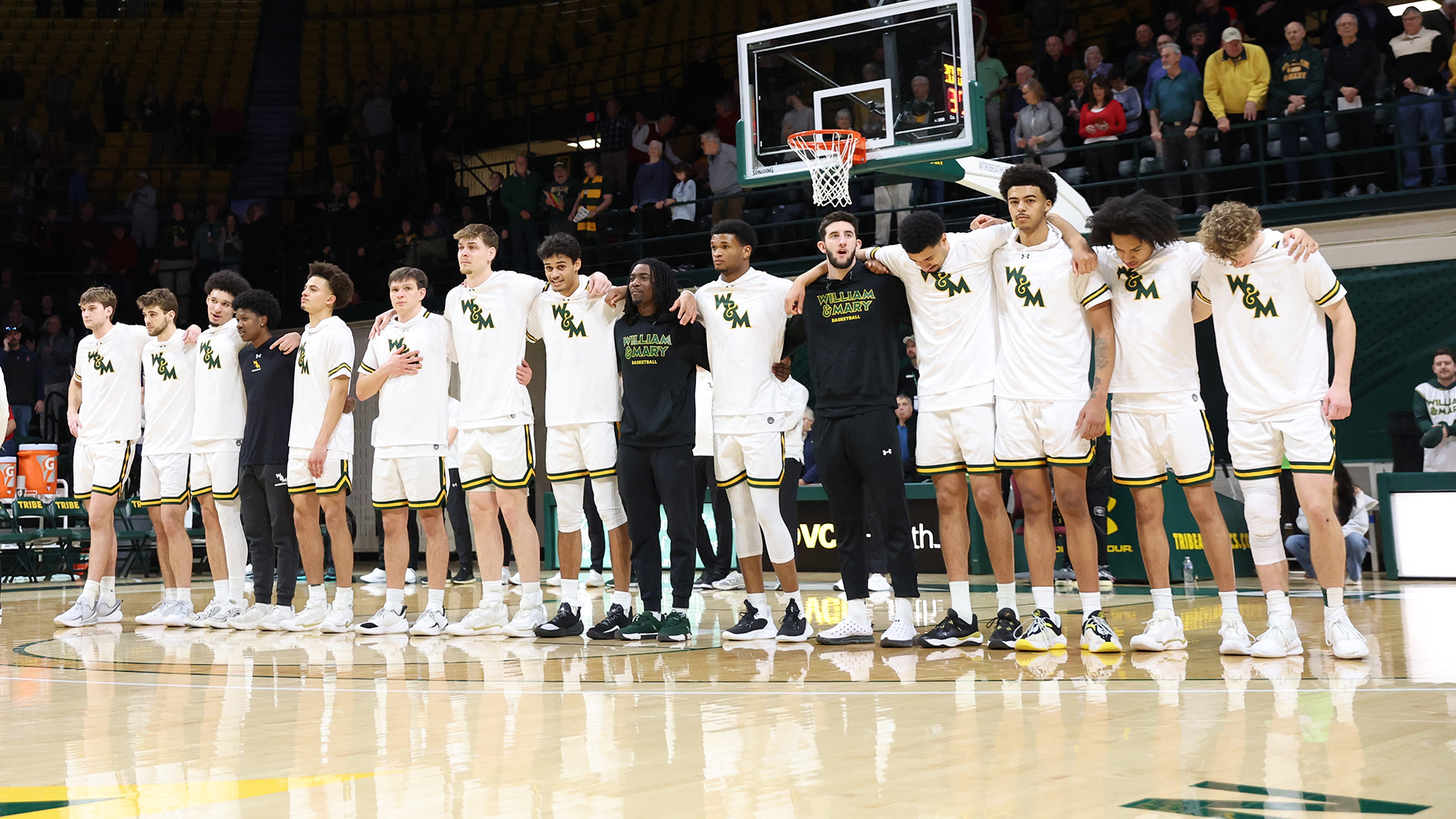 The Tribe stands arm and arm for the national anthem prior to tip-off vs. Elon. 