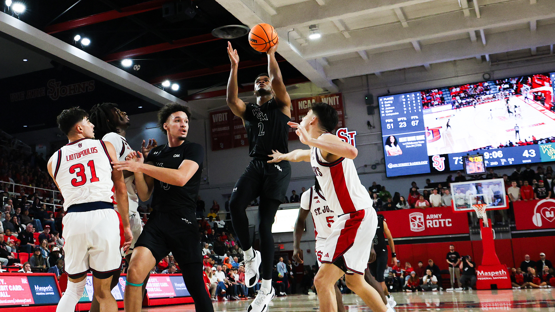 Chase Lowe shoots a floater in the lane in the Tribe's road game at St. John's 