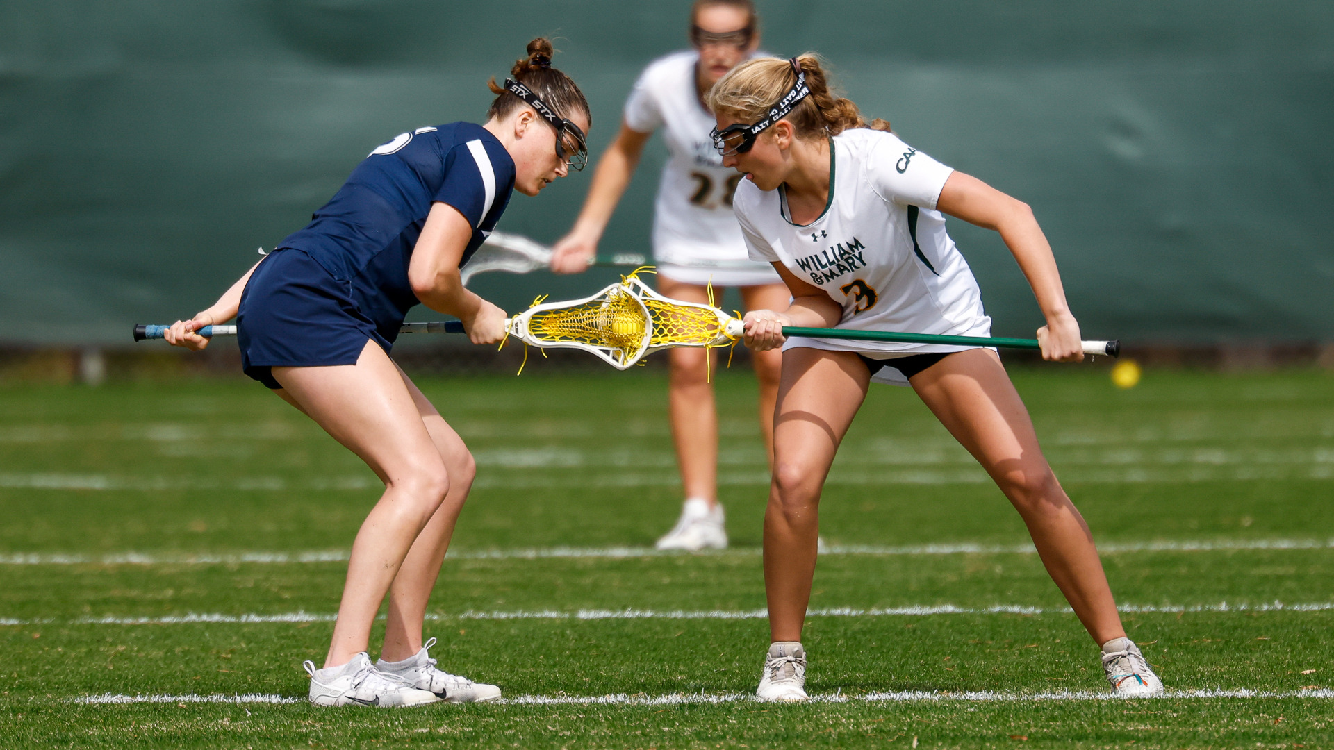 Chloe Babich prepares to take a draw control verus Xavier at Martin Family Stadium