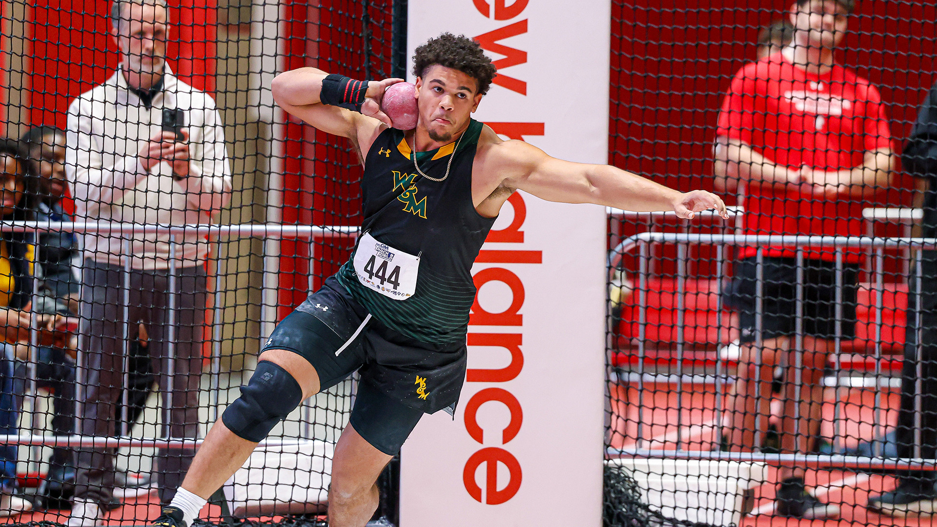 Uriah Harris spins around and gets ready to toss the shot put at the CAA Championships in Boston. 