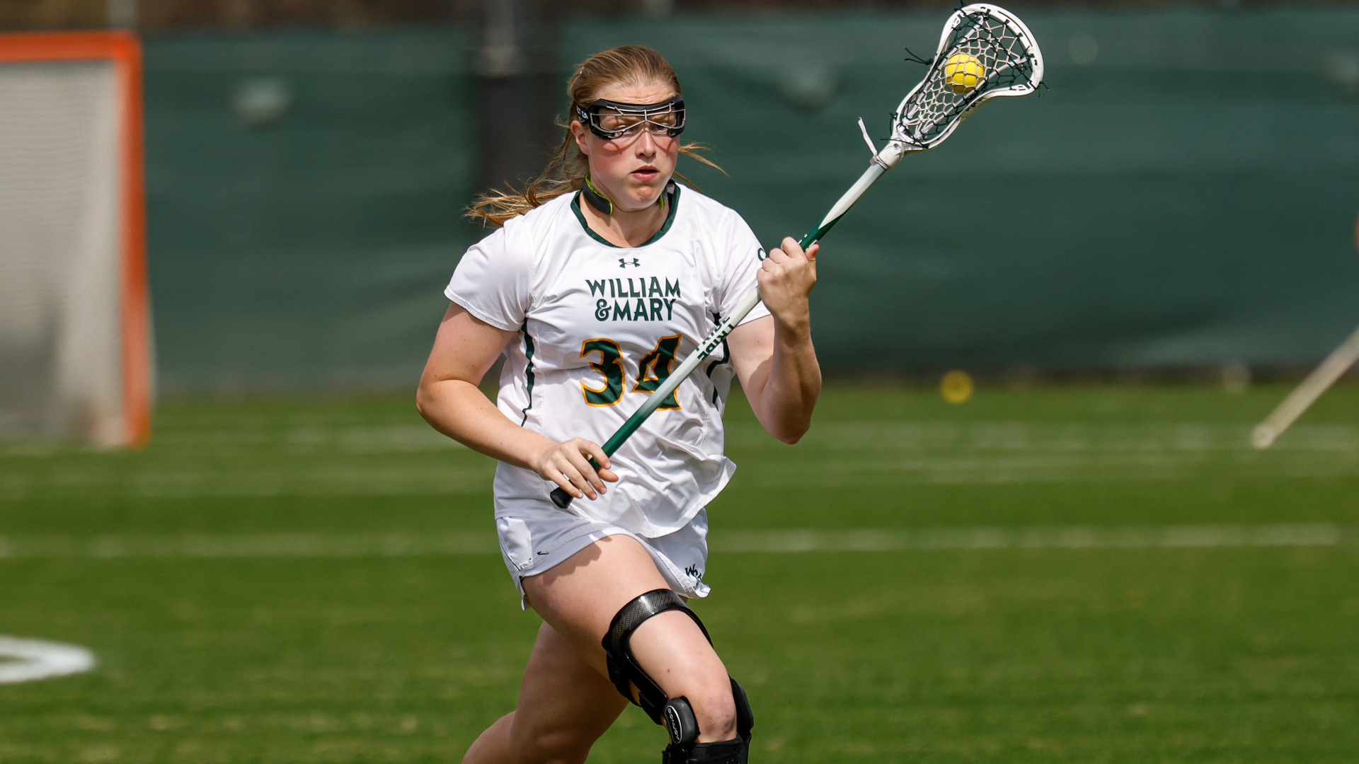 Taylor McCall runs down the field with the ball at Martin Family Stadium