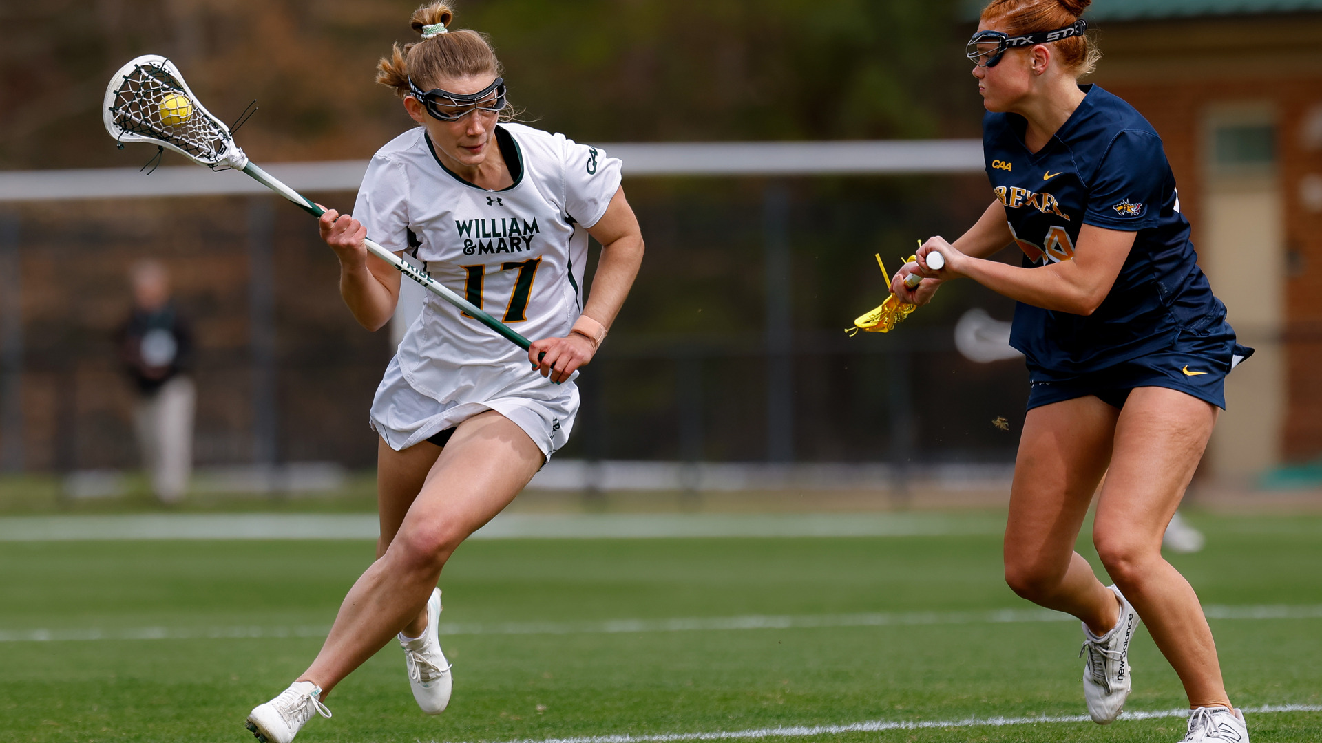 Maresa Moyer attacks the goal versus a Drexel defender during a game at Martin Family Stadium