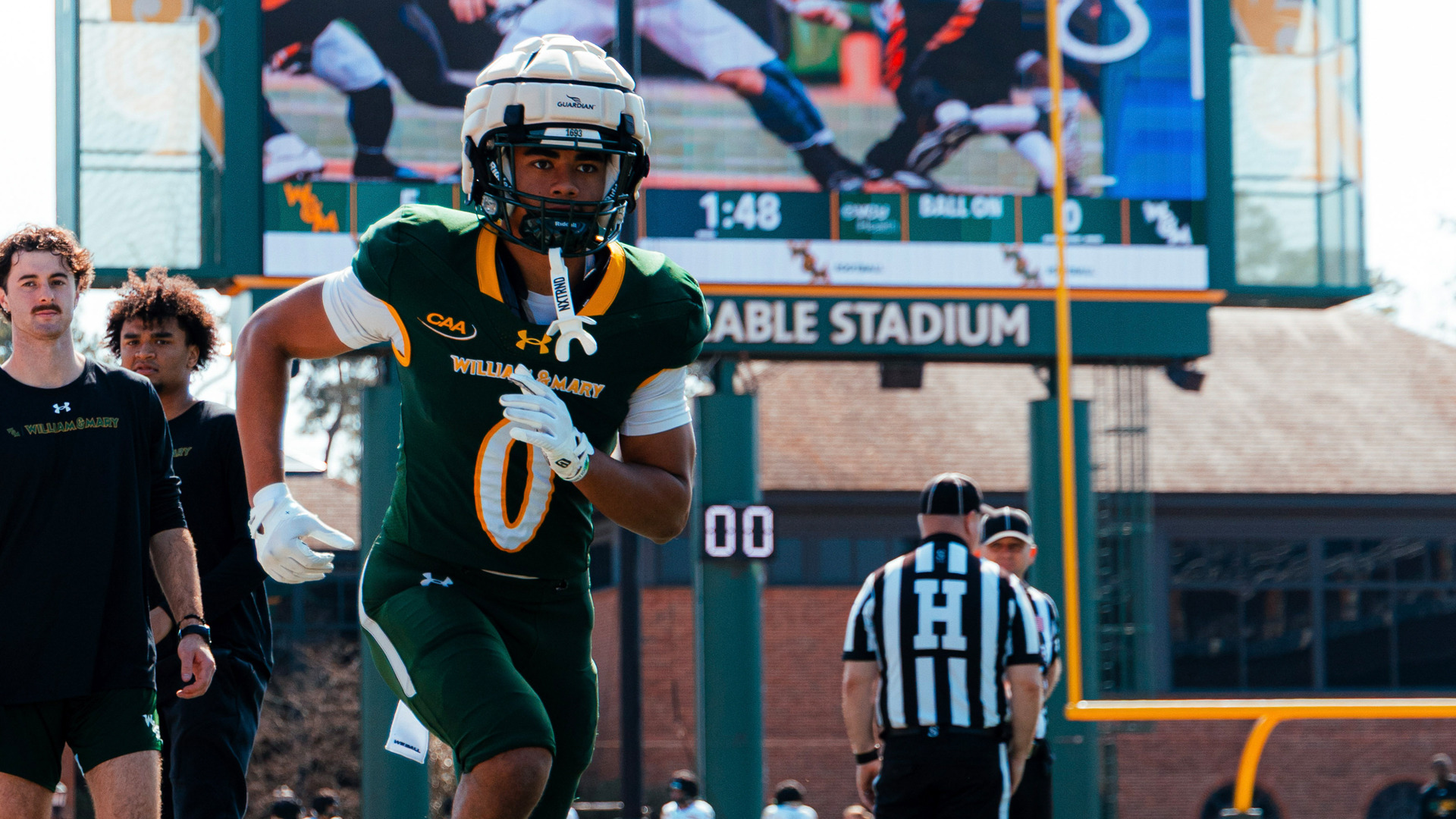 Kai Austin warms up at Zable Stadium prior to the spring game