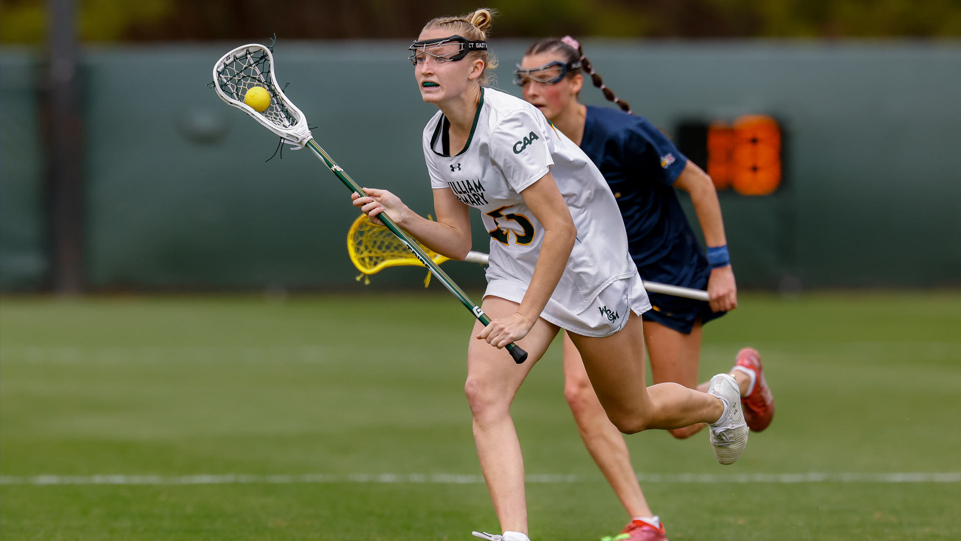 Nora Begley runs towards the goal with the ball during a game against Drexel.