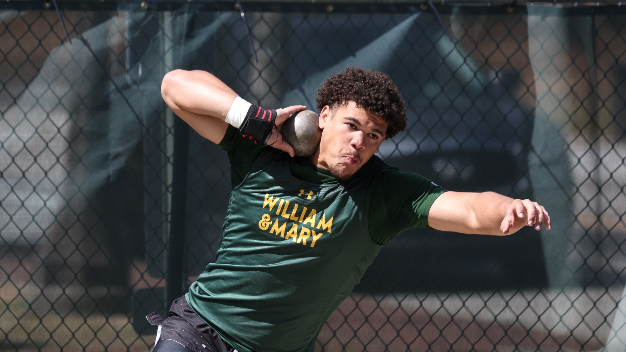 Uriah Harris throwing a shot put