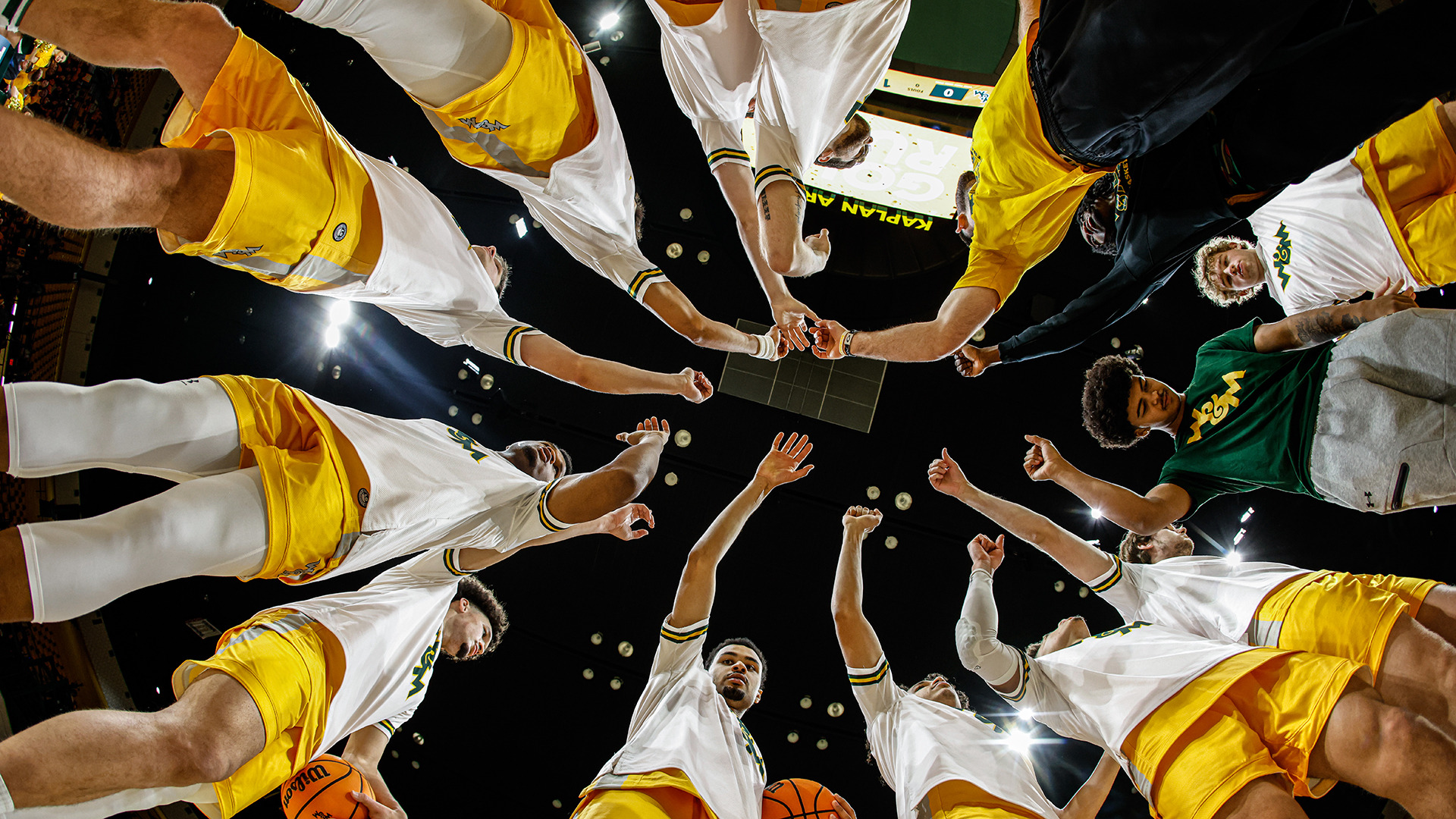The Tribe huddles up with their arms in prior to the Gold Rush game vs. Campbell. 