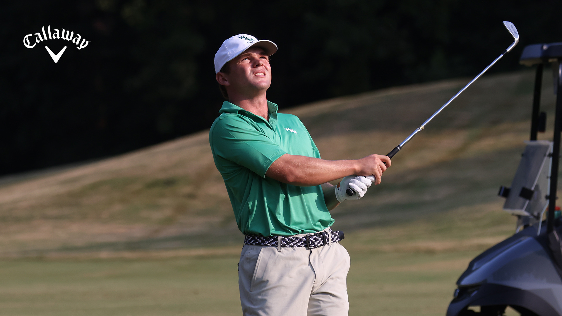 Matthew Monastero stares down a shot after following through with an iron at the UNCG event. 