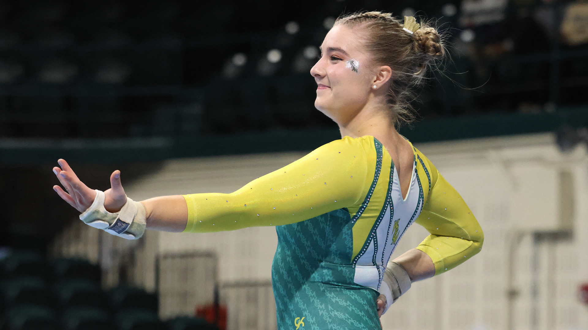 Hannah Burke competes on floor at Kaplan Arena