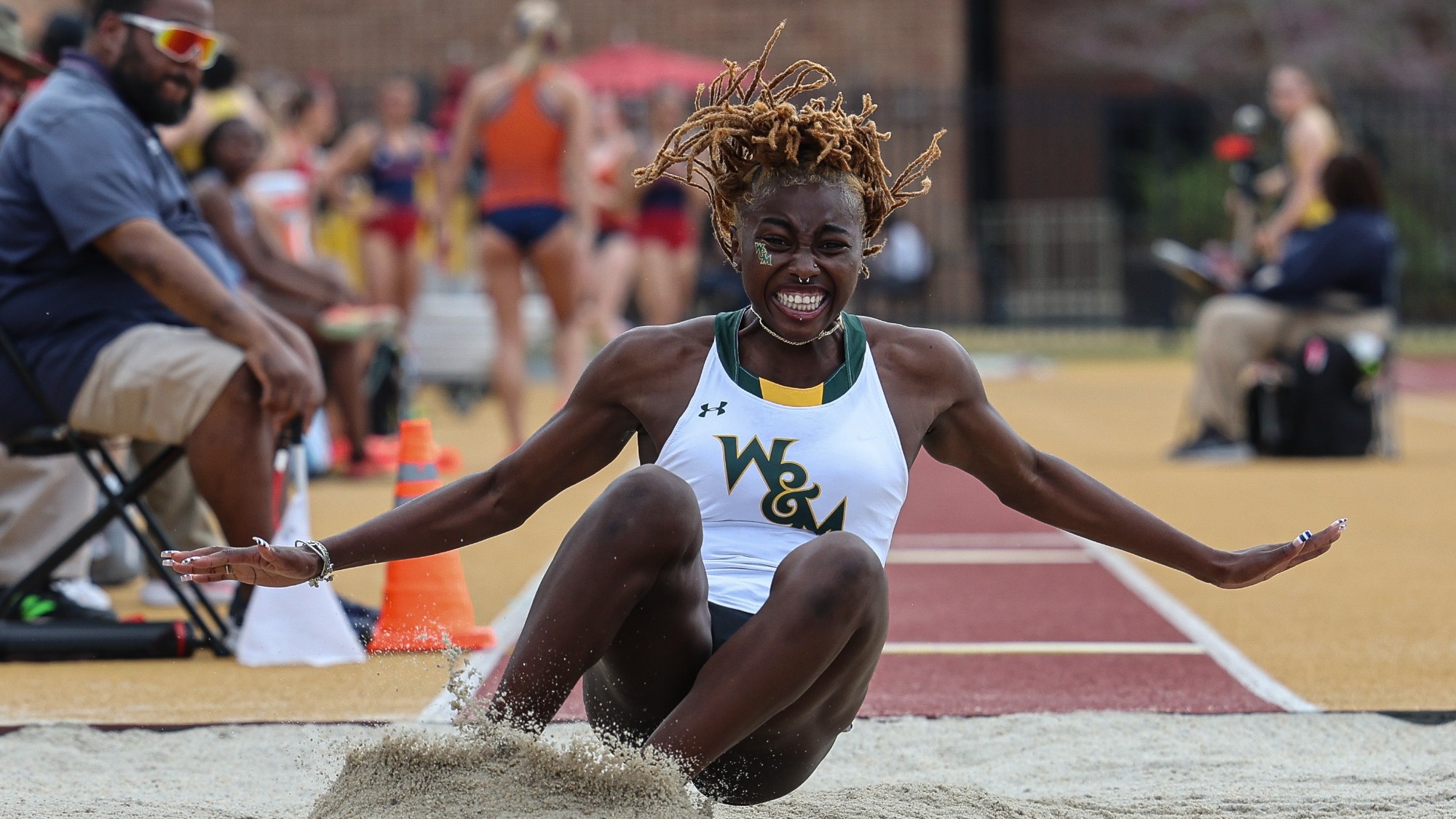 Tia Taylor competing in the long jump