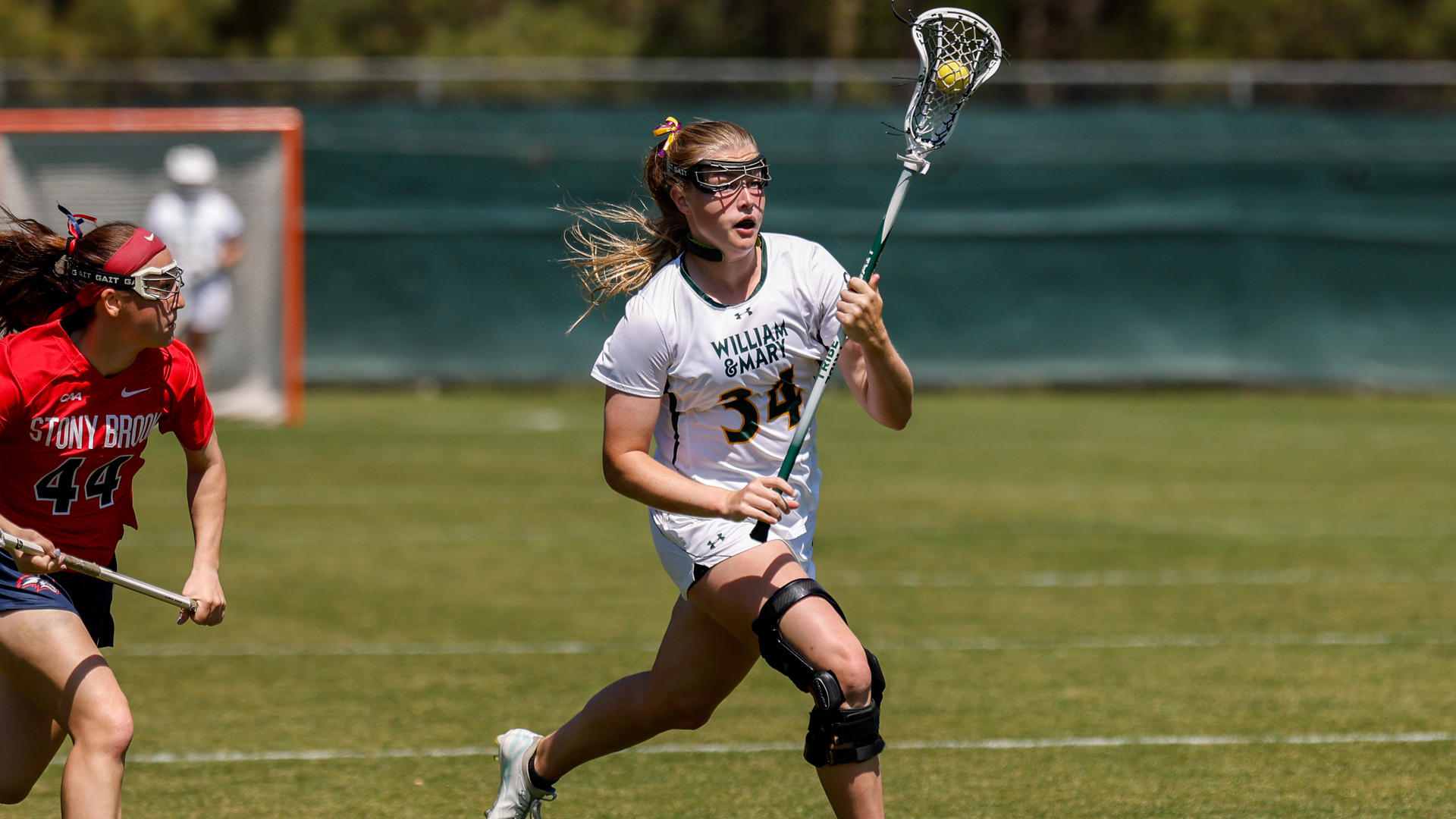 Taylor McCall runs down the field with the ball at Martin Family Stadium during a game against Stony Brook