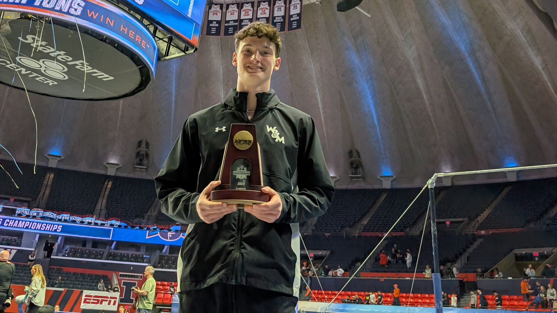 Luke Tully poses with his NCAA All-America trophy at the national championship met