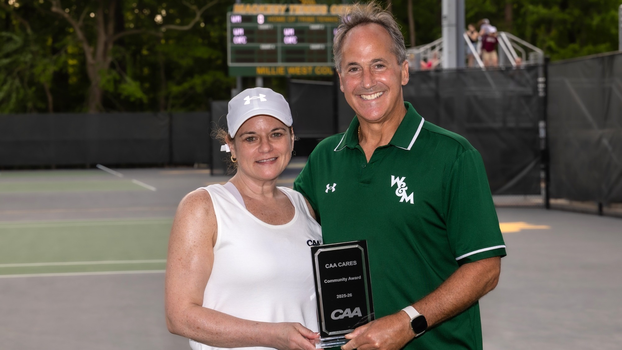 Marc Elim receiving the CAA Cares Award
