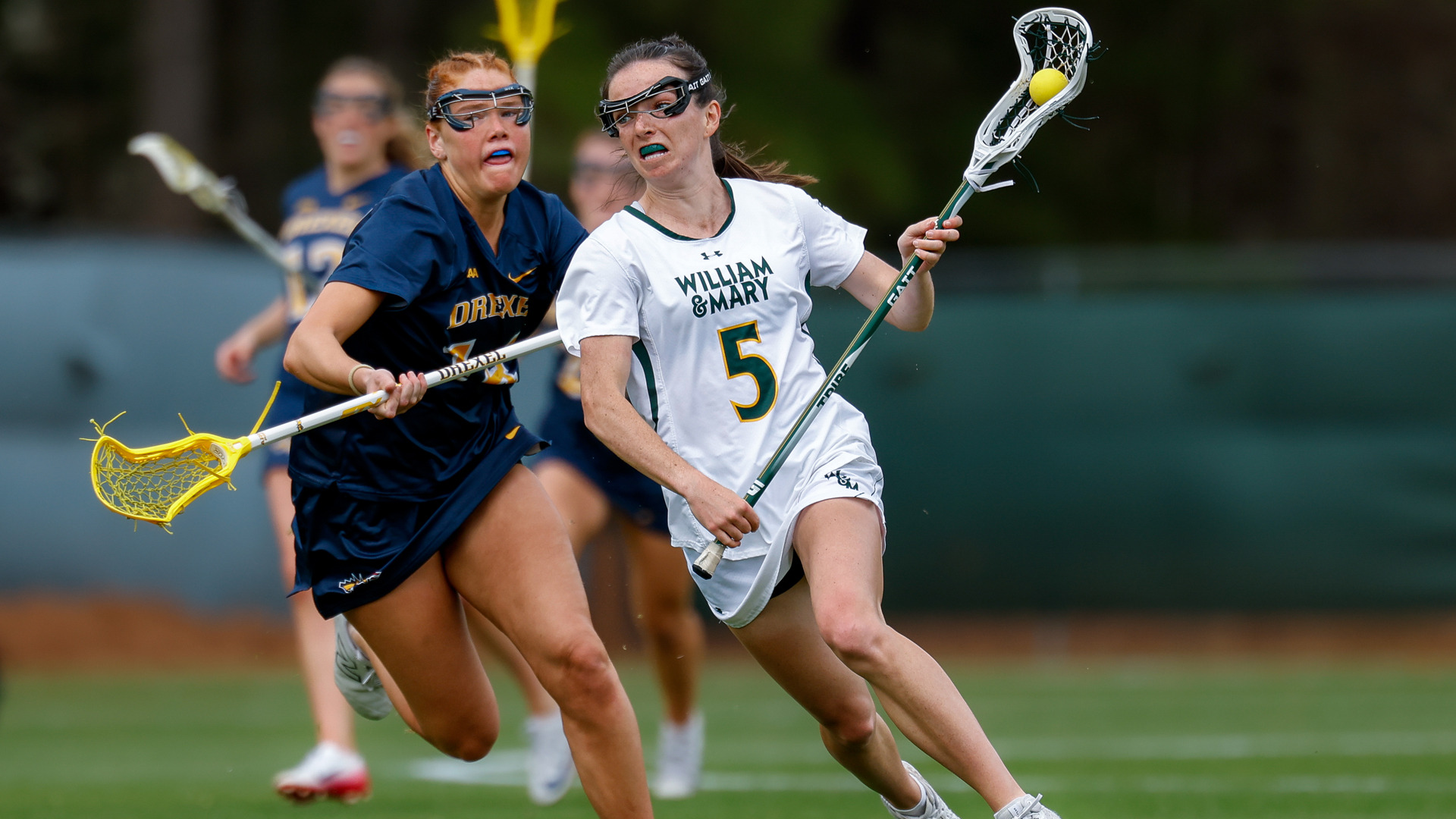 Kate Draddy runs towards the goal with the ball versus Drexel