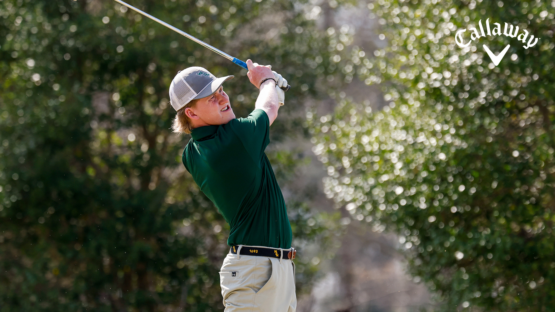 Talon Dingledine follows through in his backswing and stares down a shot during the opening round of the Golden Horseshoe Intercollegiate. 