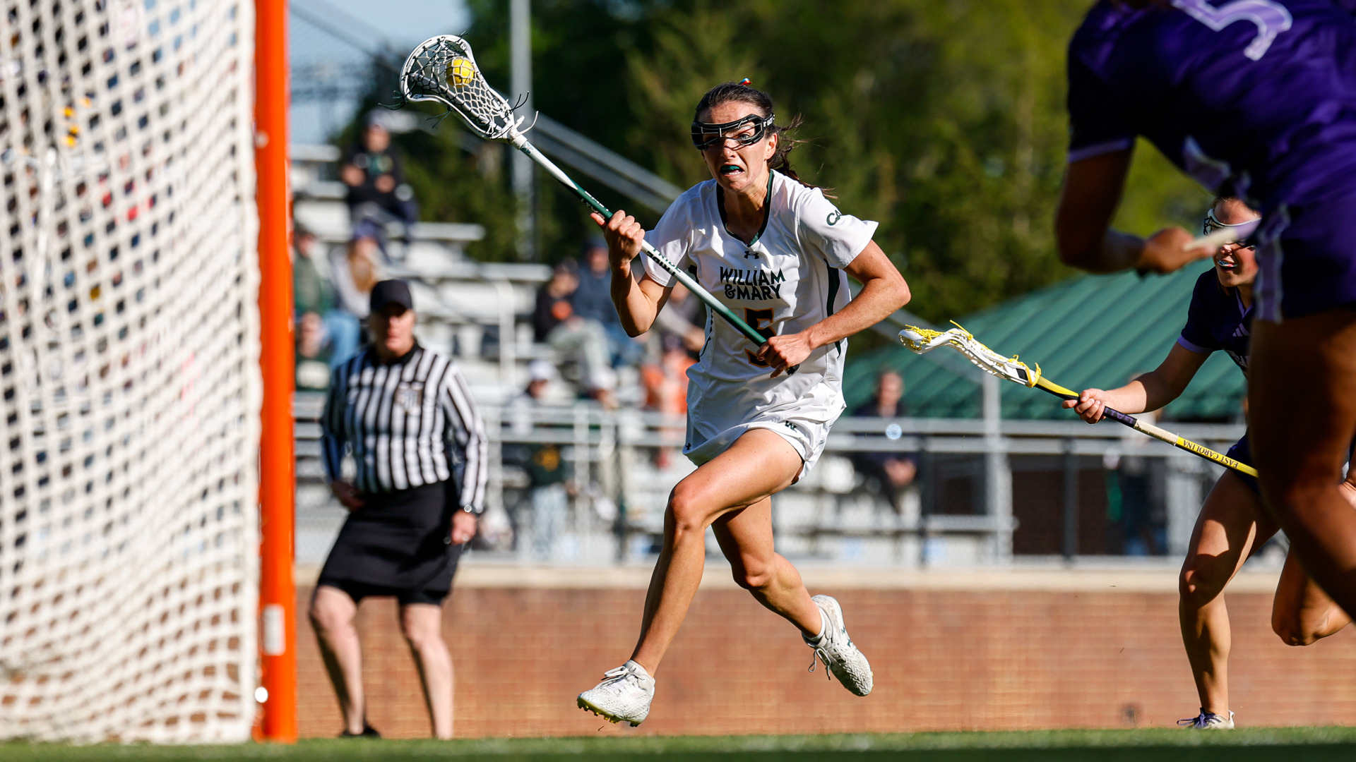 Kate Draddy runs towards the goal with the ball during a game versus ECU at Martin Family Stadium