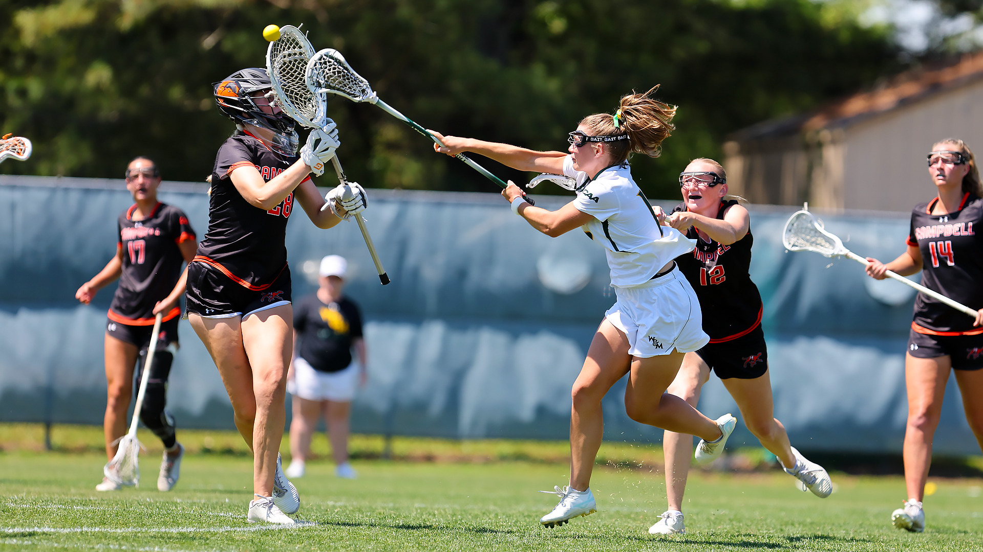 Maresa Moyer shoots the ball past Campbell's goalie during a game at Martin Family Stadium
