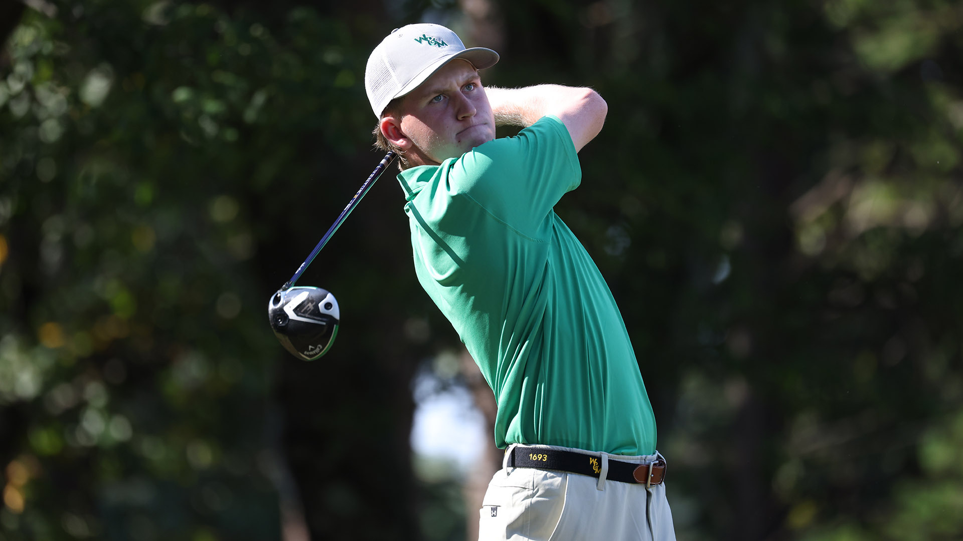 Talon Dingledine watches in drive off the tee during a practice round of the UNCG Tournament in the fall of 2025. 