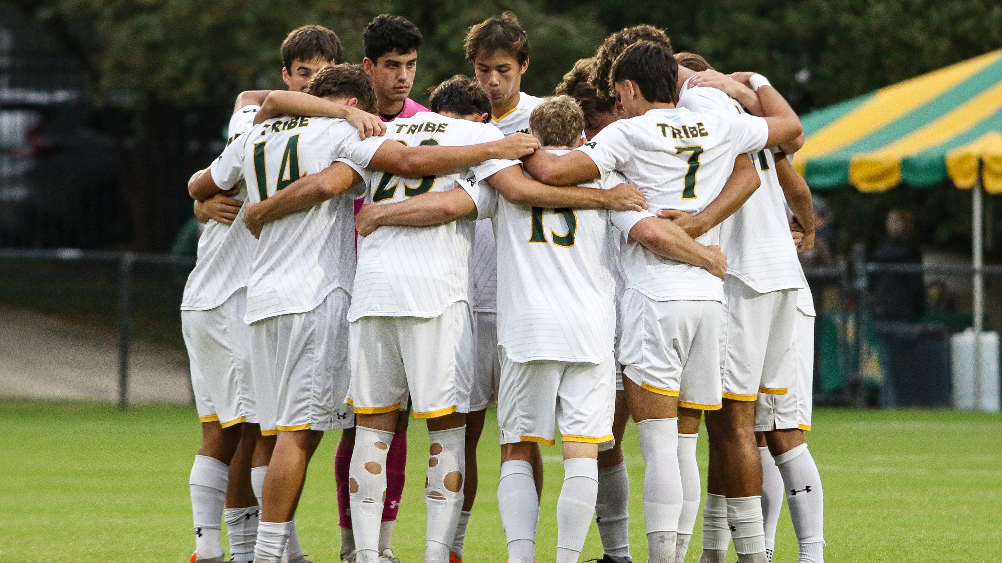 Tribe men's soccer huddled up together during a game vs. UNCW on 10/7/25