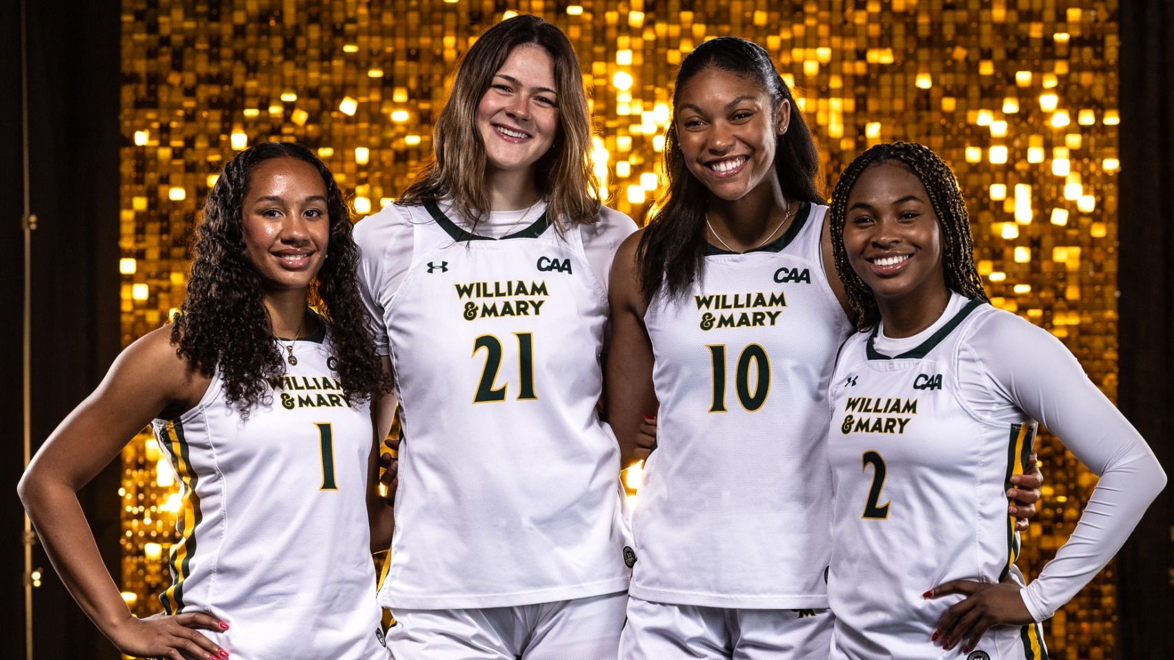 Cassidy Geddes, Natalie Fox, Marley Long and Monet Dance pose in front of a gold backdrop
