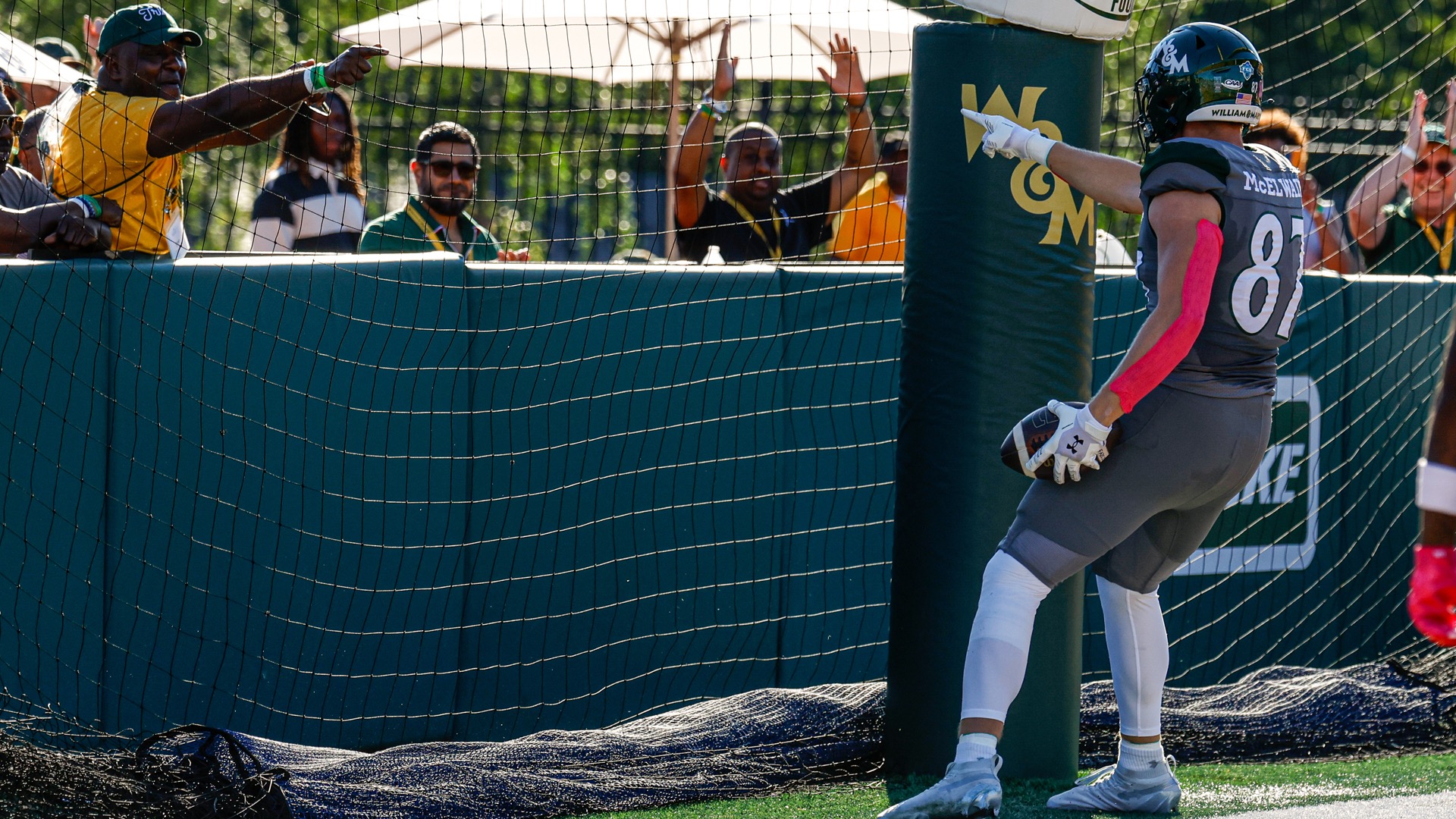 Sean McElwain celebrates a touchdown at Zable Stadium by pointing at a W&M fan, who is pointing back at him