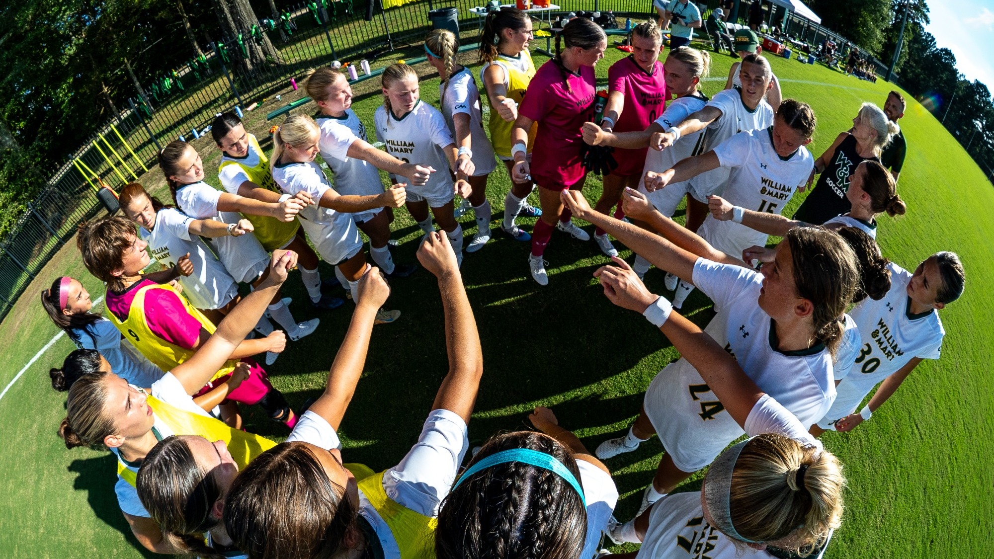 Women's soccer huddled up before the scrimmage vs. George Washington