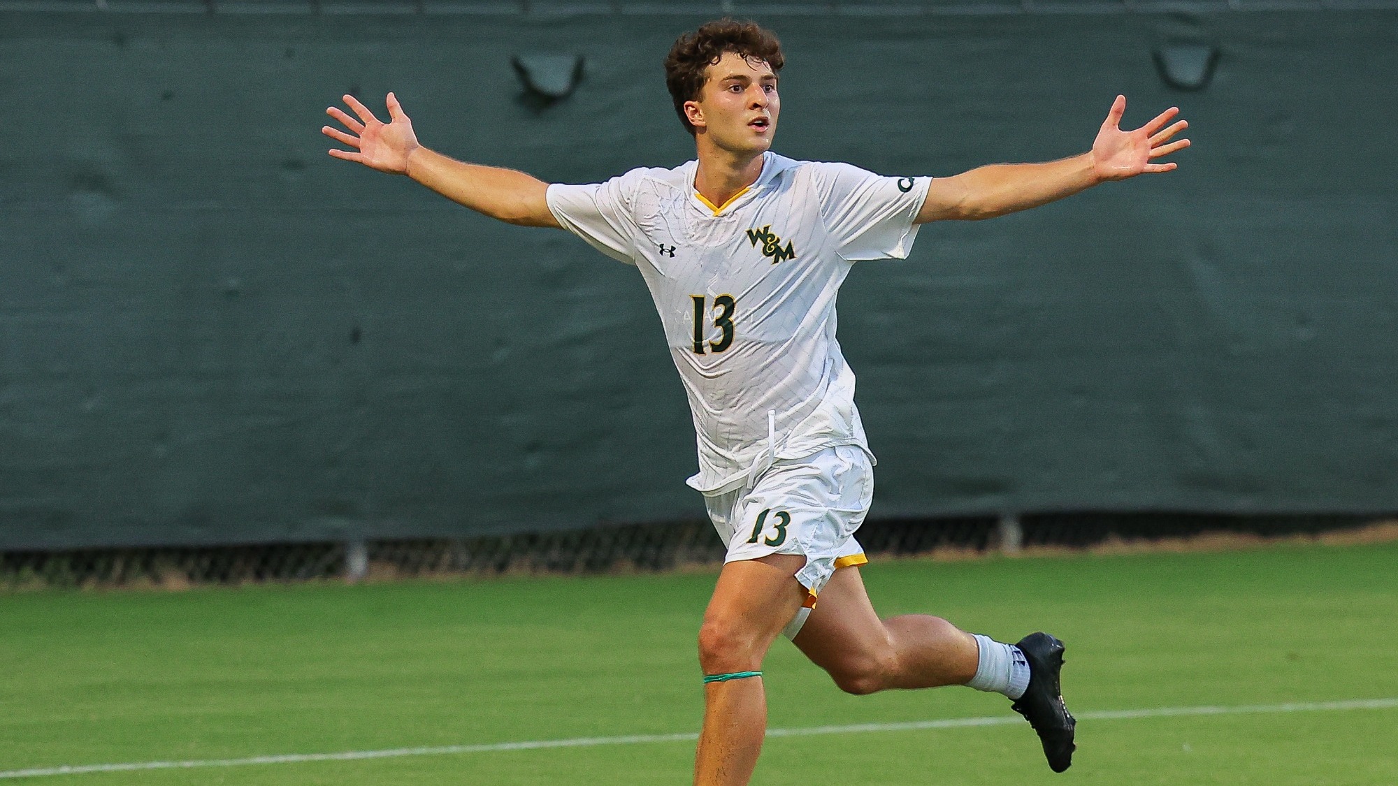 Alex Garrison celebrates after scoring his second goal for the Tribe vs. Radford