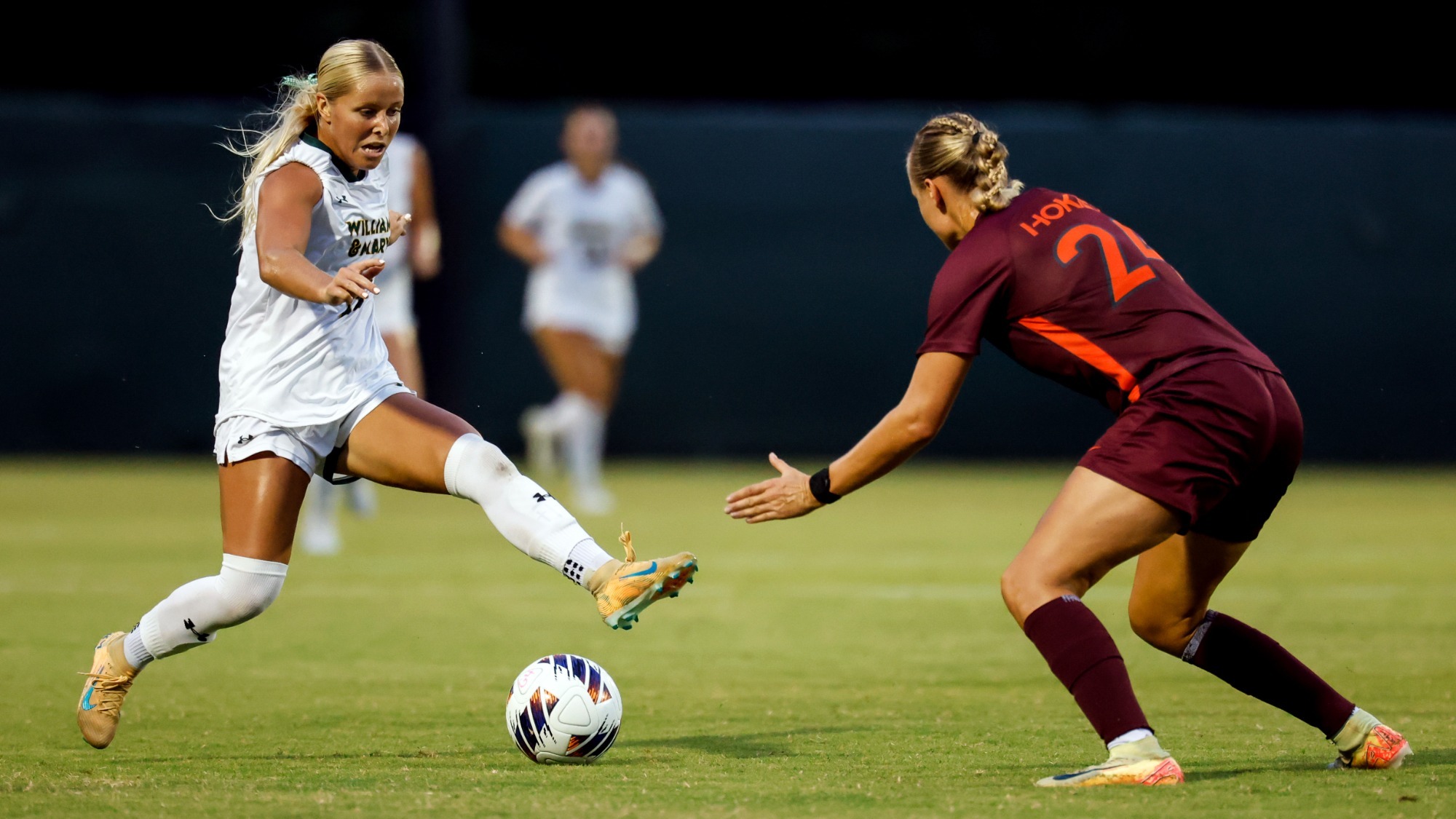 Mia Abbey competing against Virginia Tech