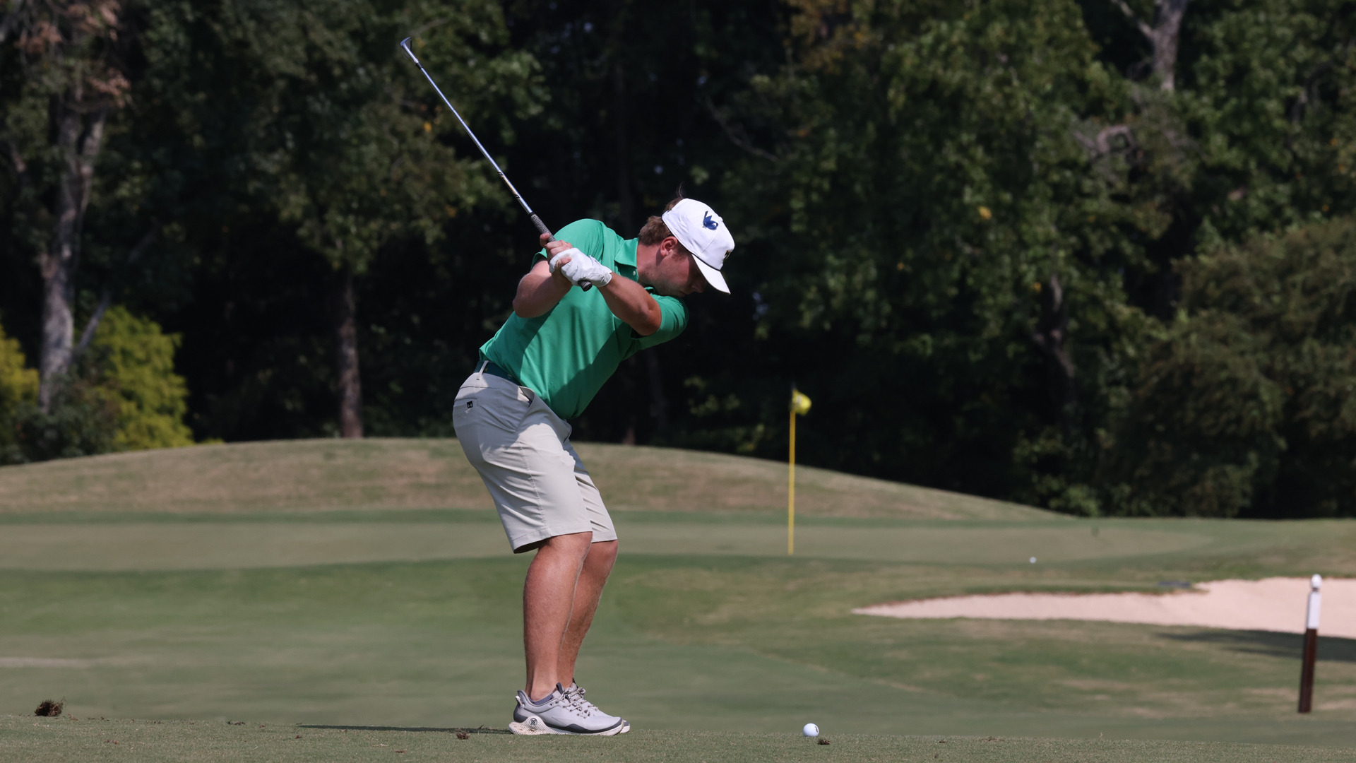 Preston Burton swings a golf club