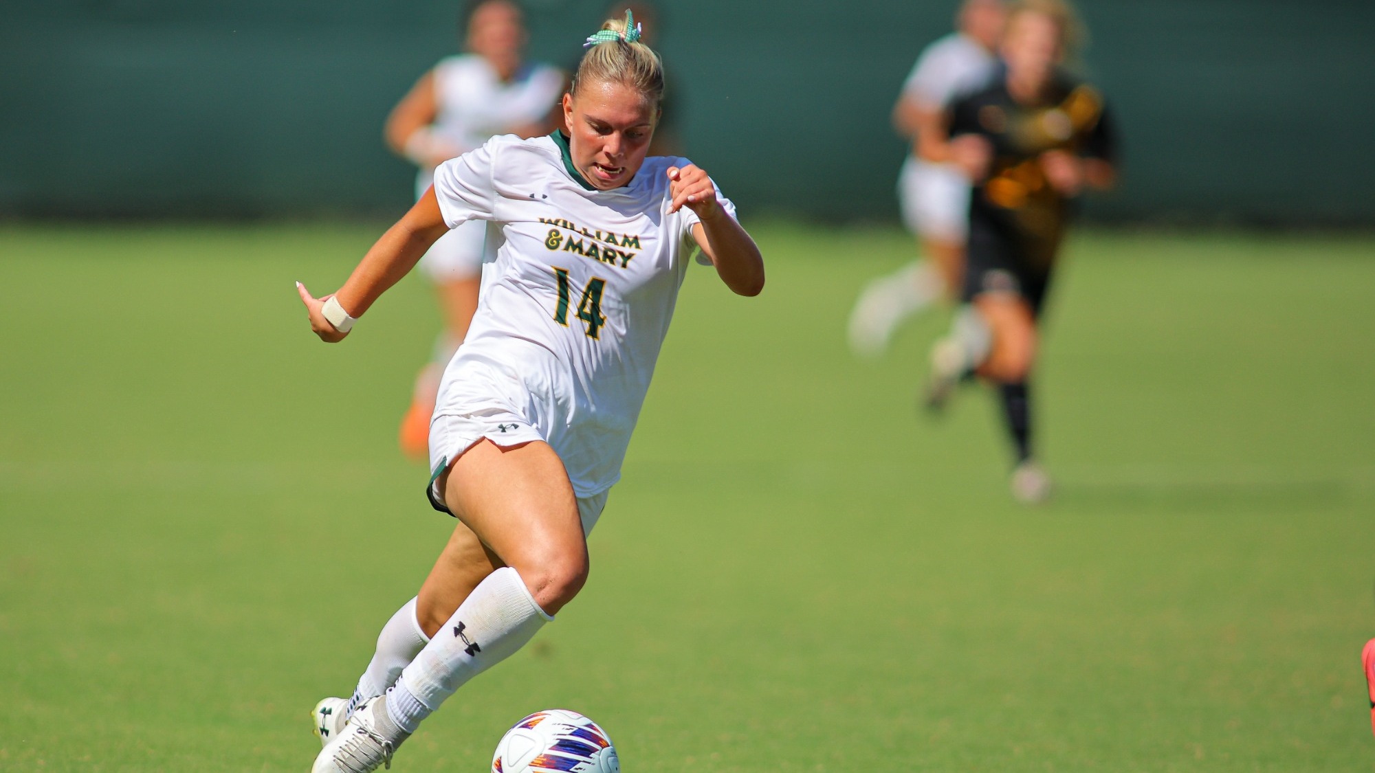 Ellie Leffler competing in a game vs. VCU