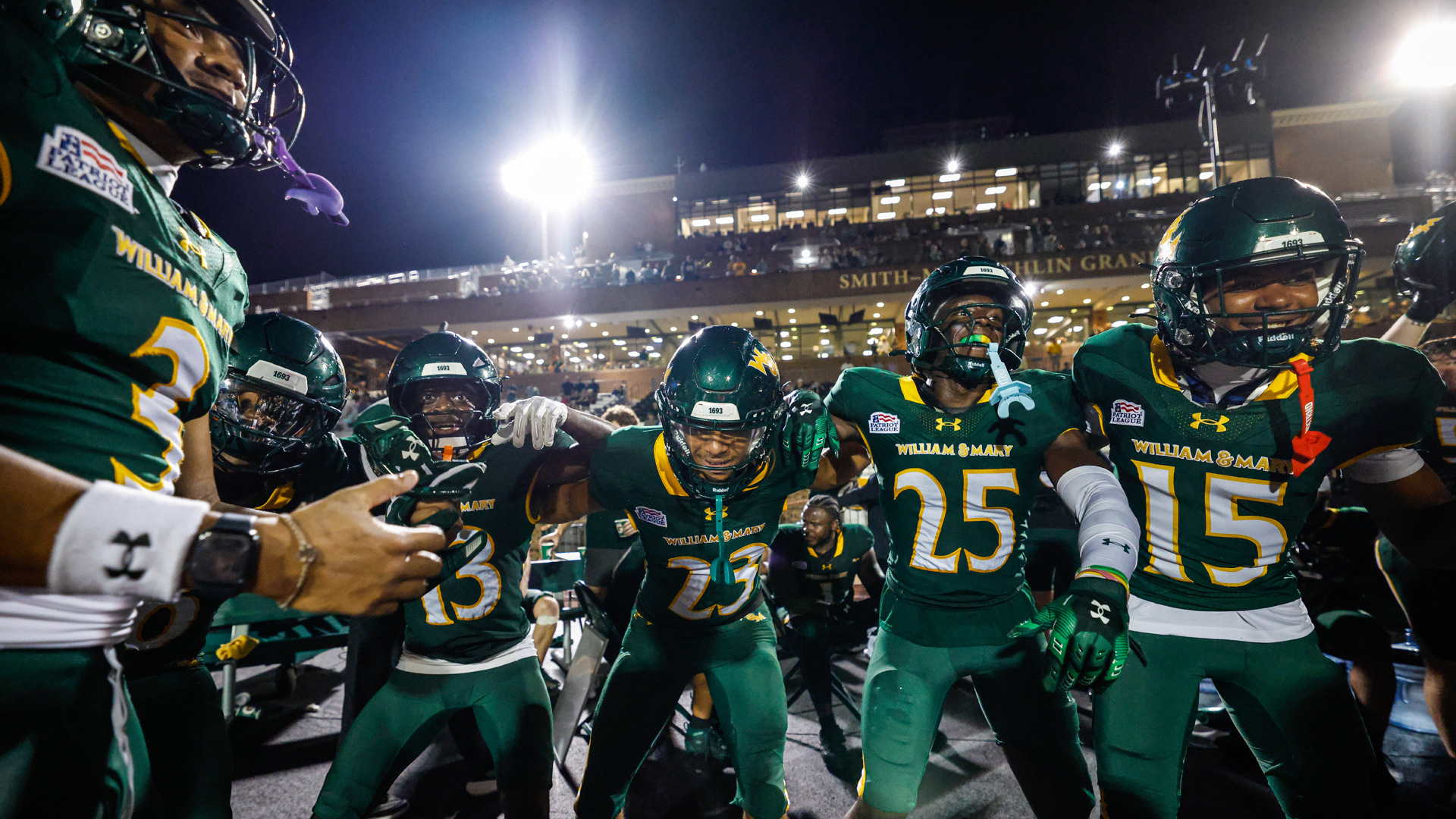 W&M defensive backs group photo on the sidelines at Zable Stadium