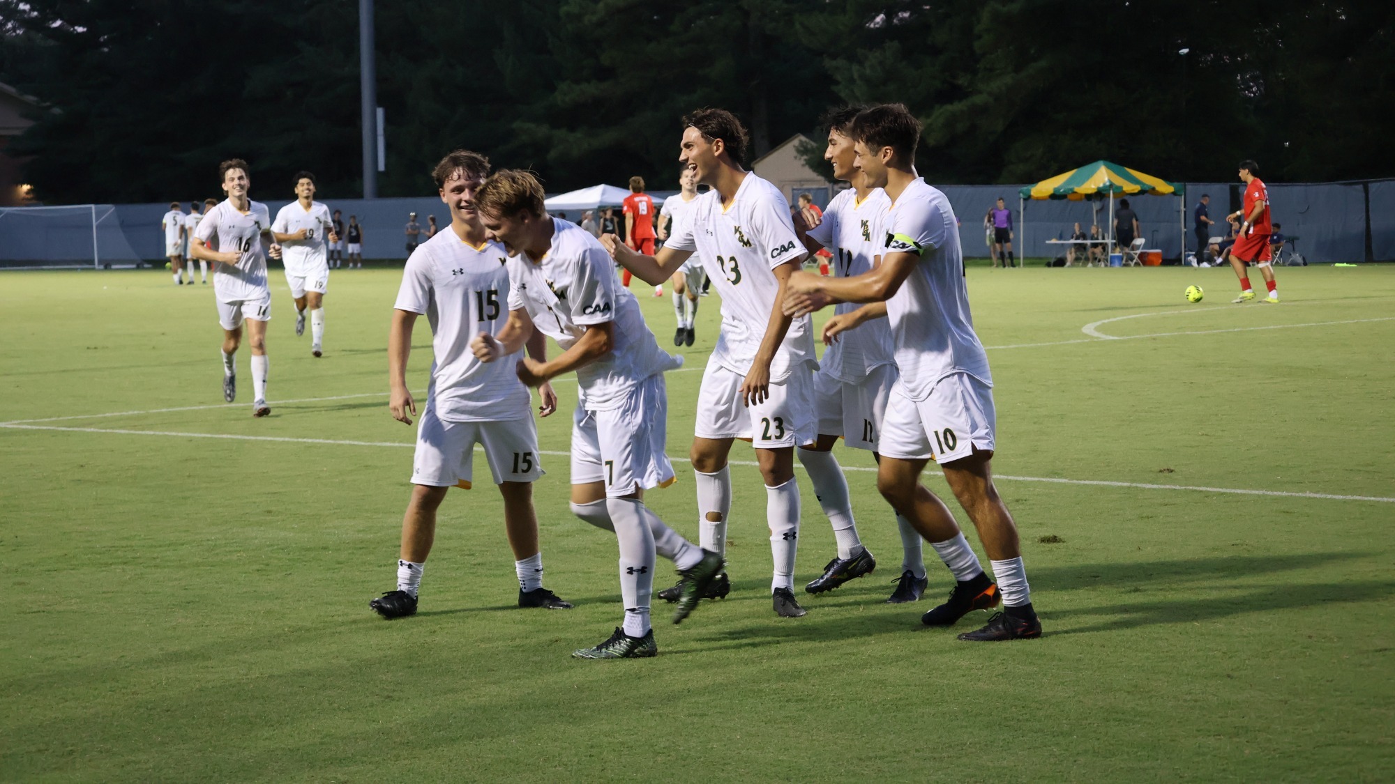 W&M men's soccer celebrates scoring a goal