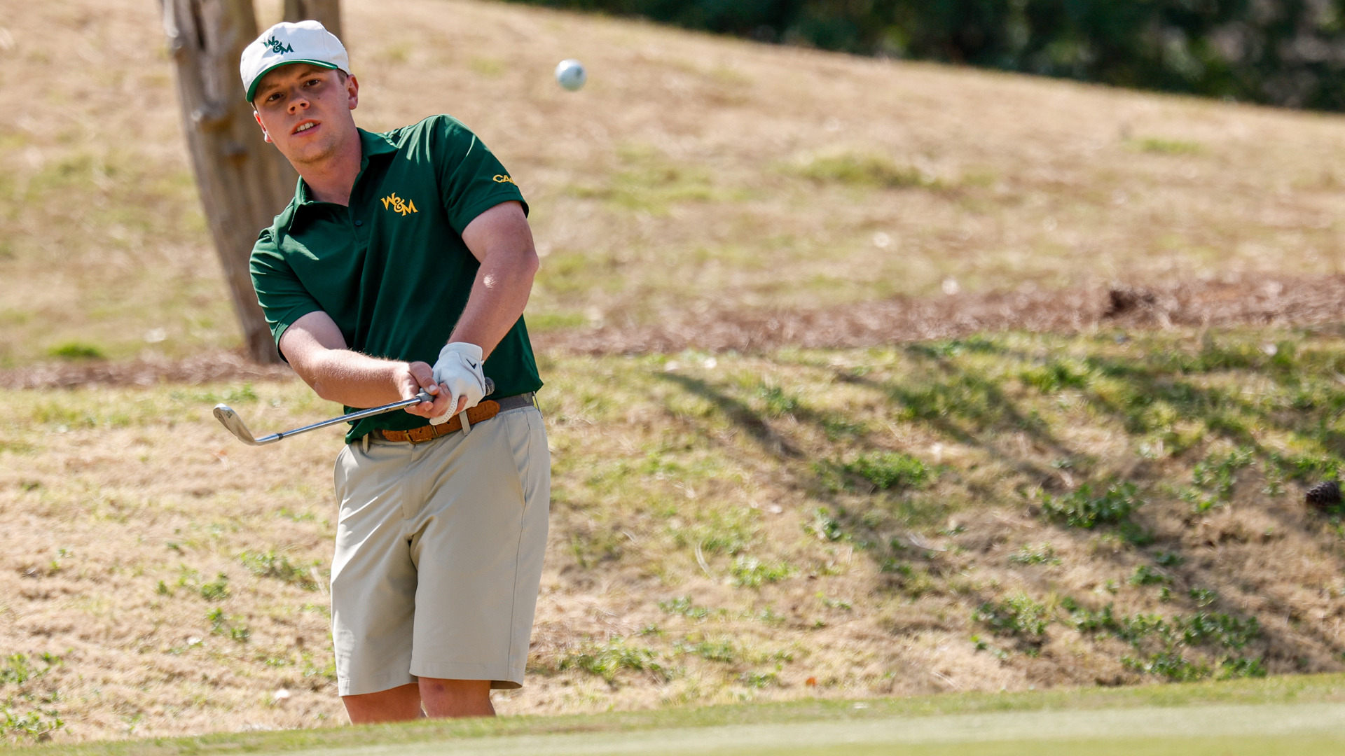 Preston Burton chips the ball onto the green