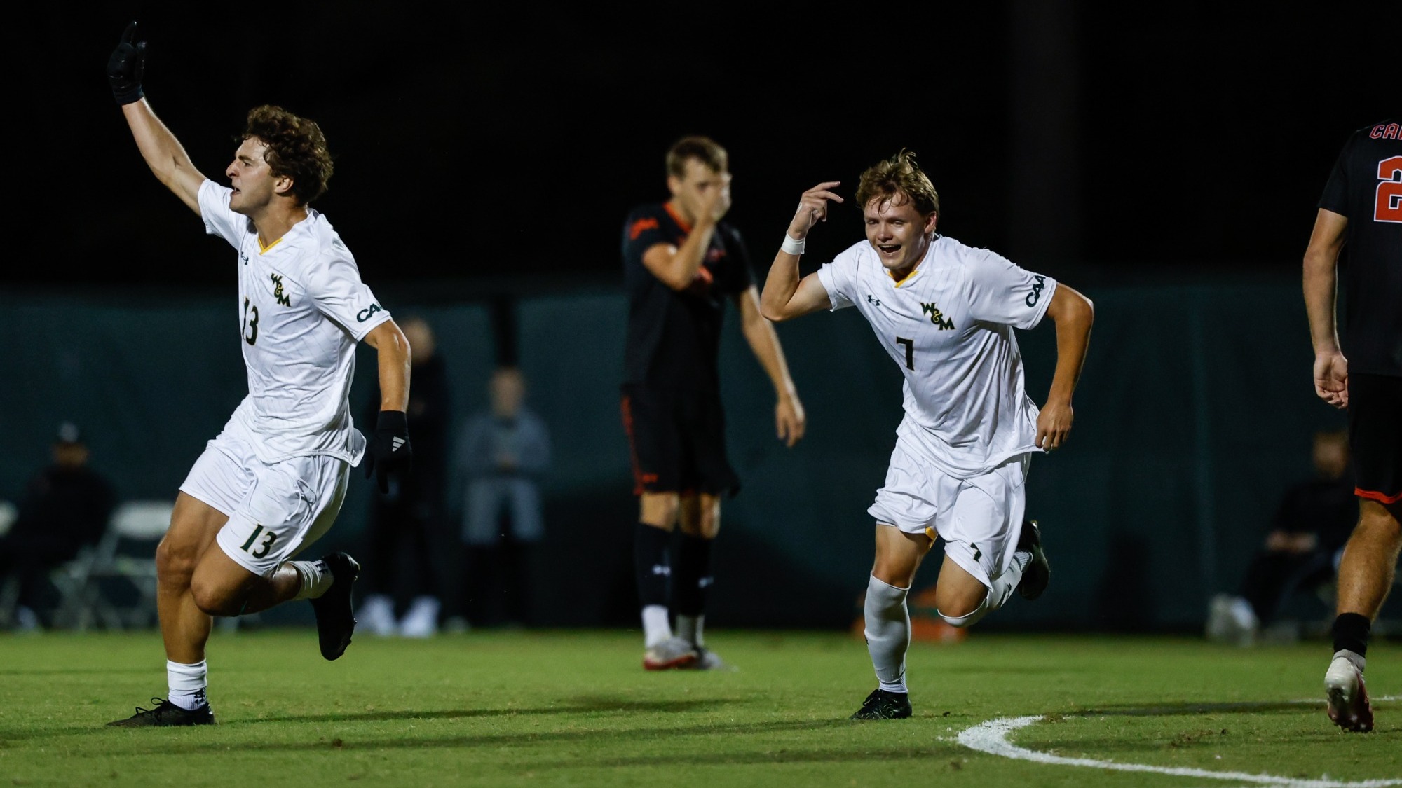 Alex Garrison and Aidan Gatchell celebrate against Campbell