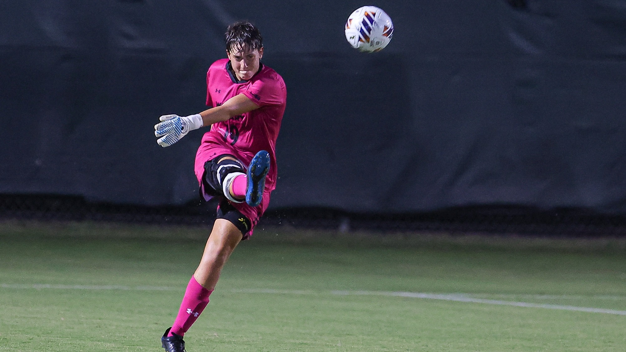 Mia Tegeris kicking the ball in a game vs. Liberty