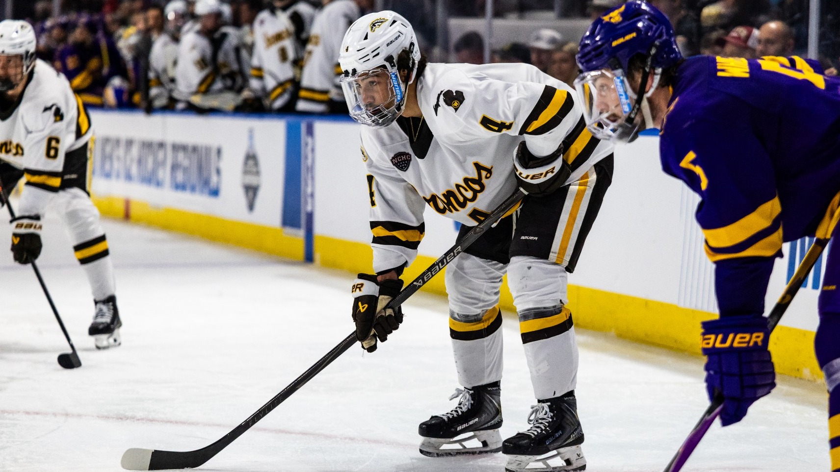 Zaccharya Wisdom waits for a faceoff in an NCAA Tournament game against Minnesota State