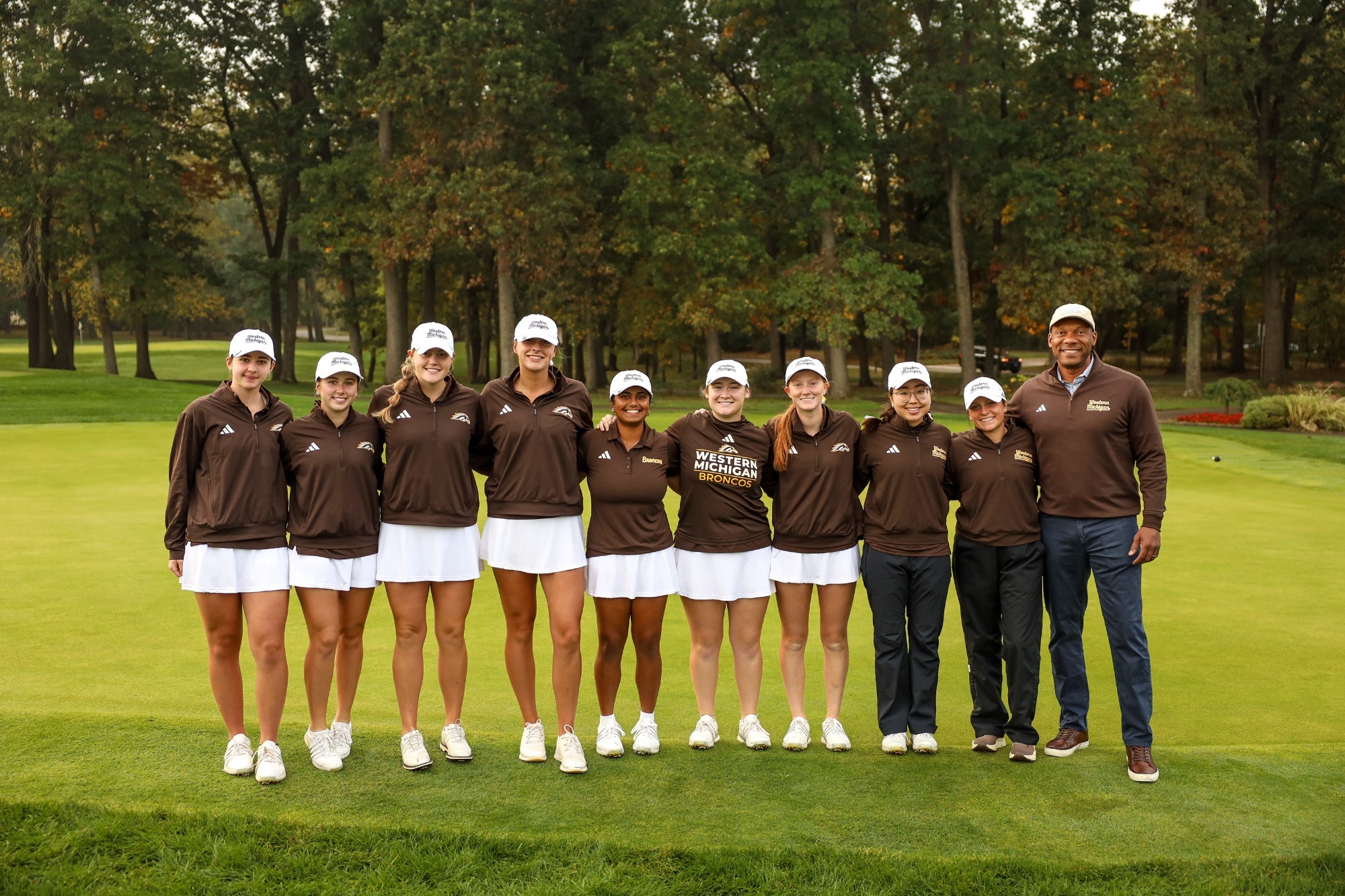 The women's golf team poses for a picture before the Bronco Fall Classic with AD Alex Gary