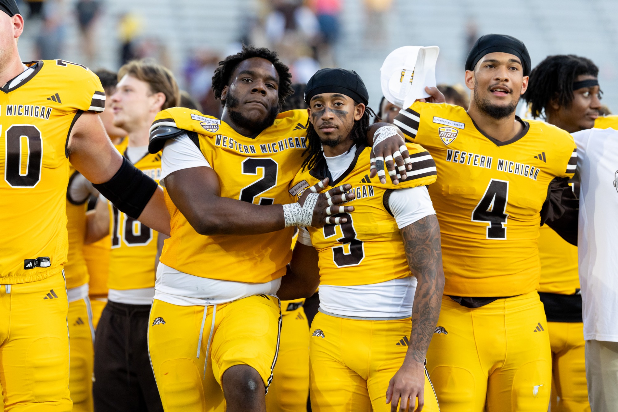 The Broncos celebrate a win over Kent State. 
