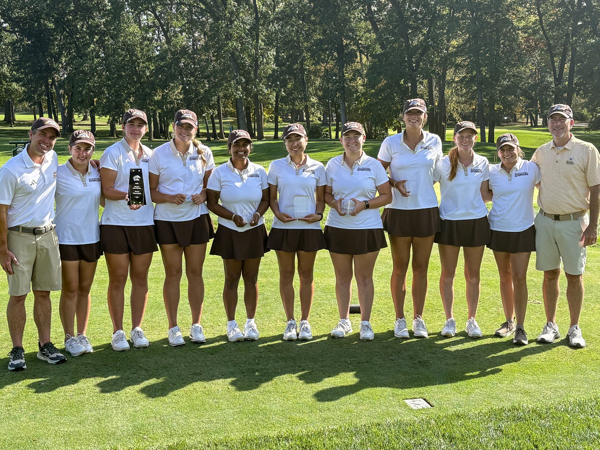 The 2026-27 Bronco women's golf team poses with the team and individual awards from the Bronco Fall Classic