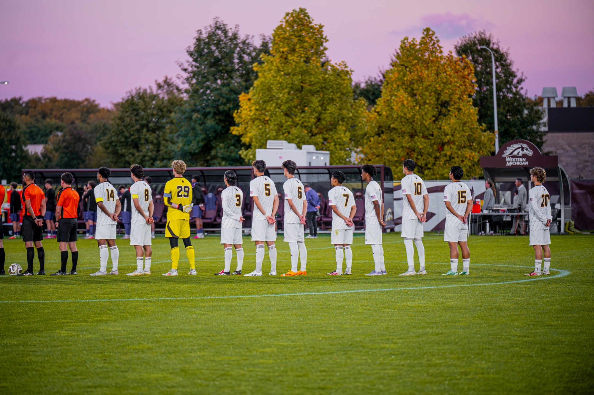 Western Michigan men's soccer starting lineup stands at midfield for the playing of the National Anthem