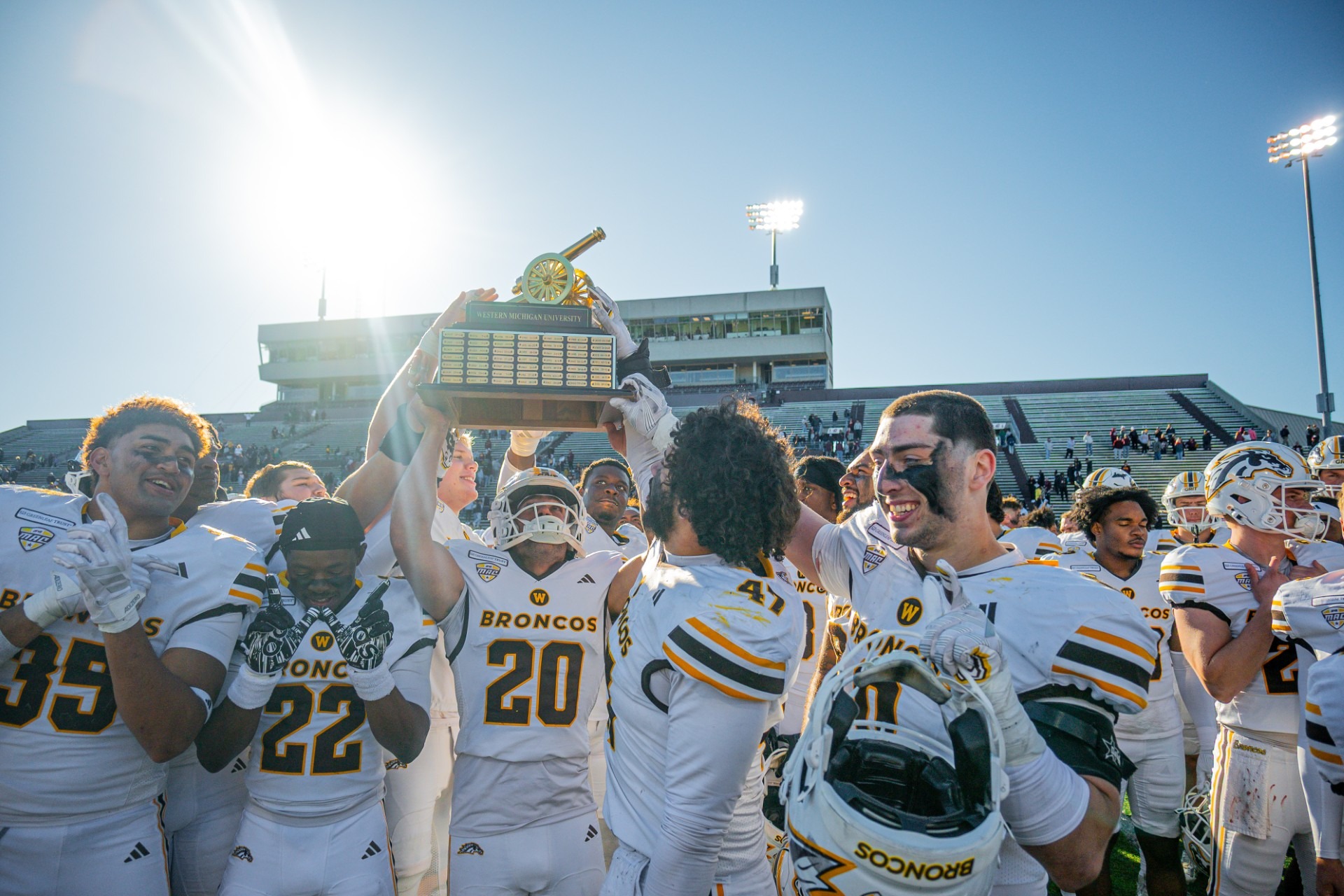 Western Michigan celebrates retaining the Victory Cannon after a 21-14 win at Central Michigan.