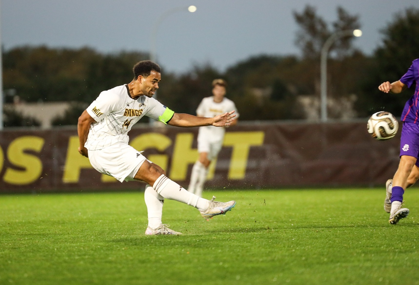 Christian Shannon finishes a free kick