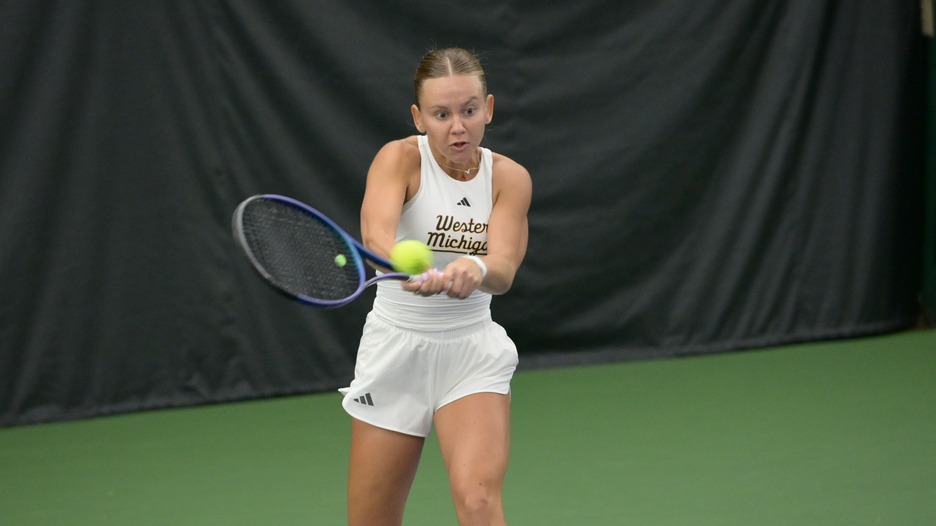 Weijerman returns a serve in the MAC Doubles Round of 16