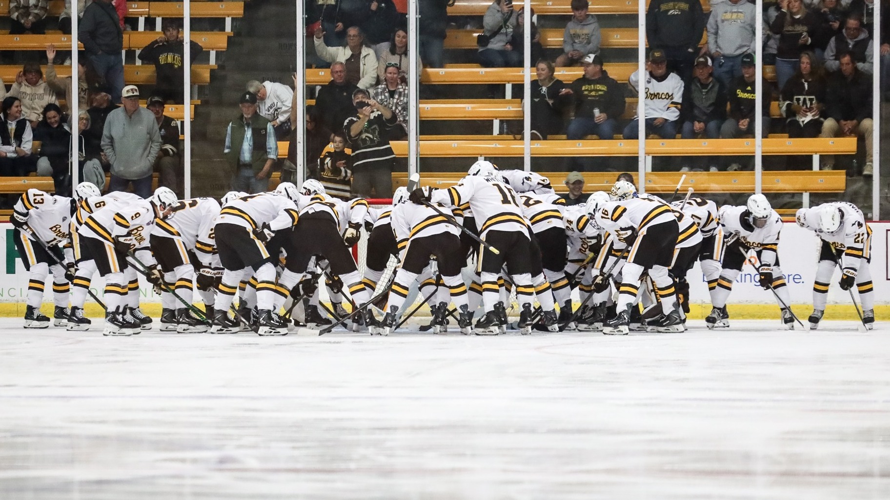 The Broncos huddle up before their exhibition game against Western Ontario