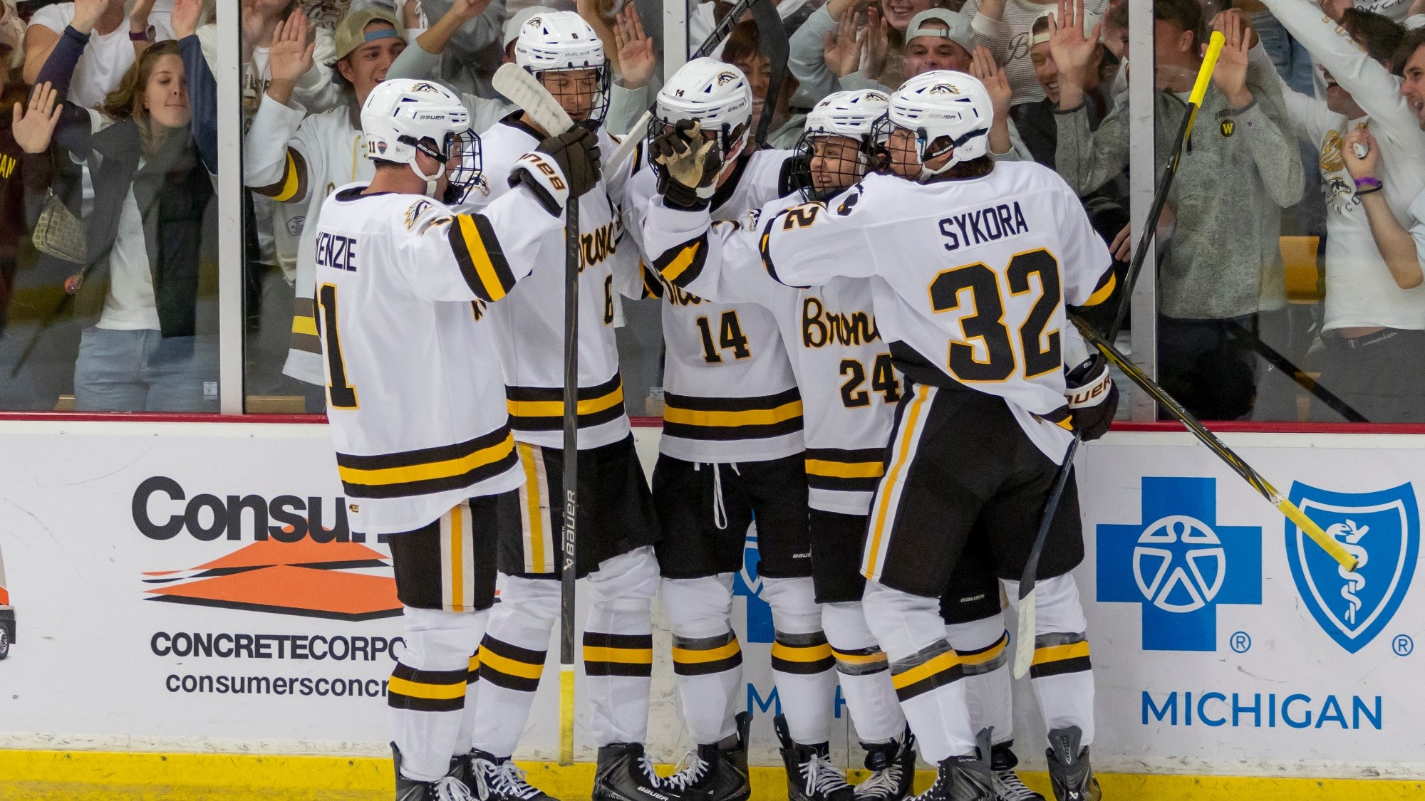 The Broncos celebrate after scoring their first goal of the season