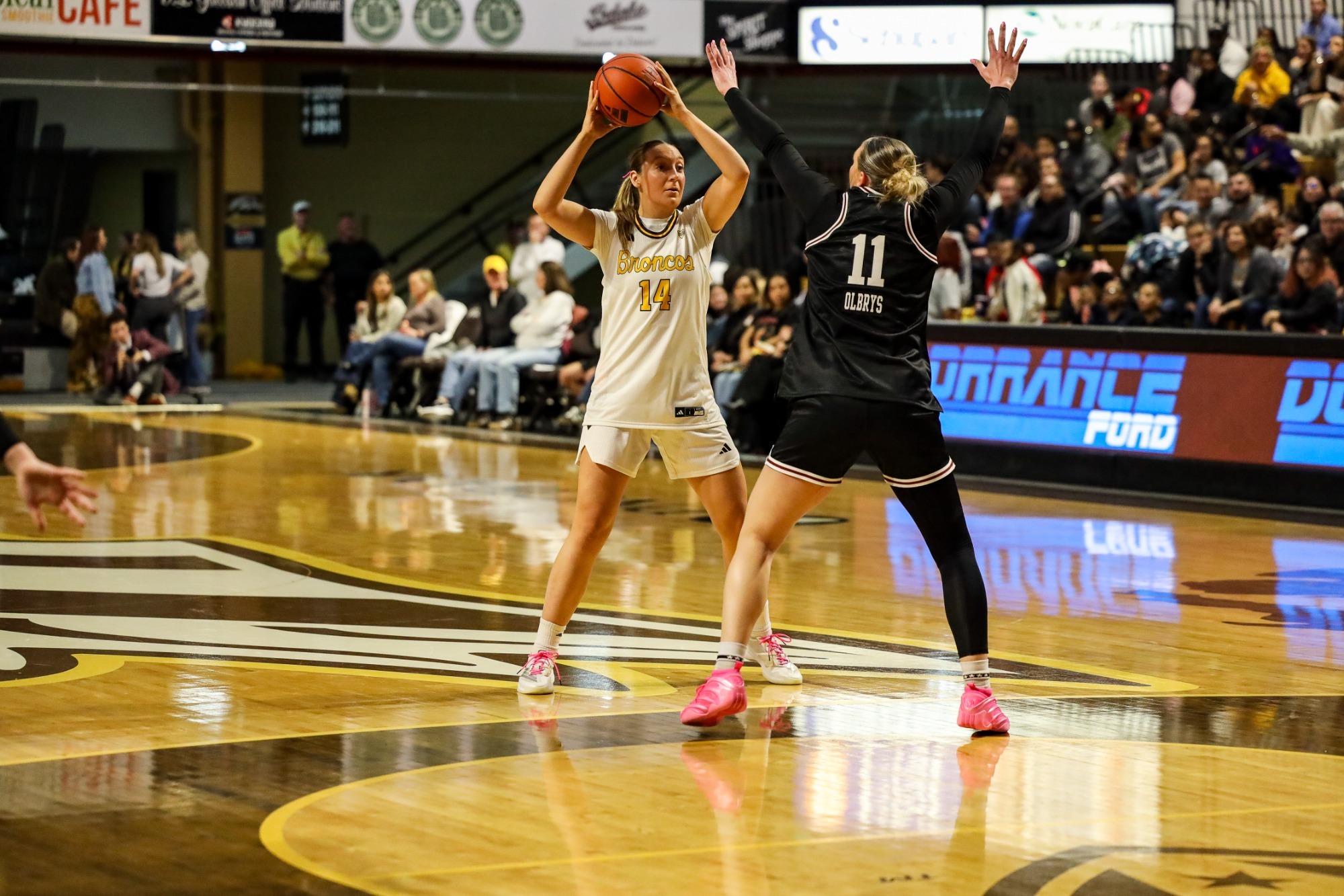Forward Mary Clare Brusek looks for an open teammate against UMass 