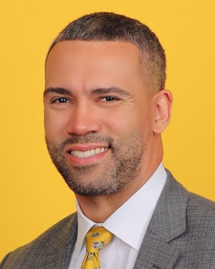 Head shot of new WMU men's basketball coach Kahil Fennell