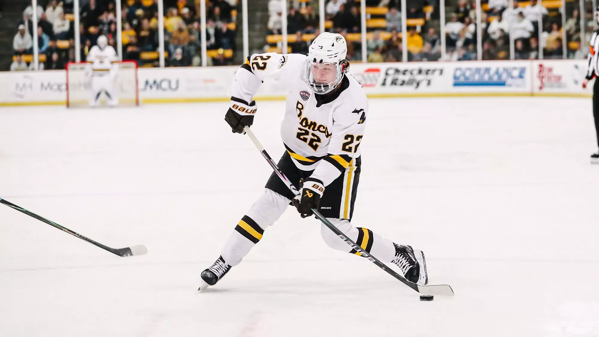 Hakarienen shoots the puck